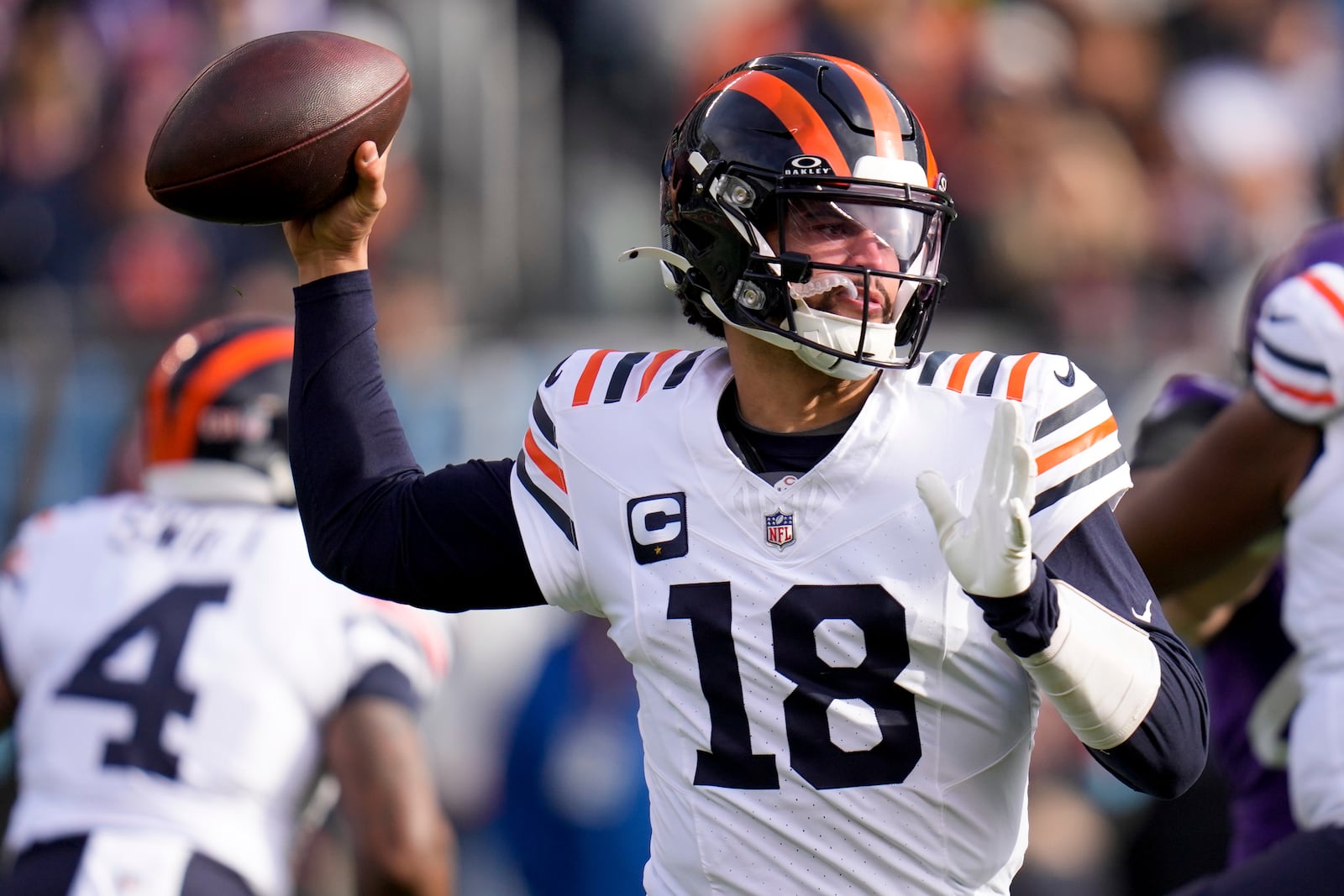 Chicago Bears quarterback Caleb Williams (18) throws a pass during the first half of an NFL football game against the Minnesota Vikings, Sunday, Nov. 24, 2024, in Chicago. (AP Photo/Erin Hooley)