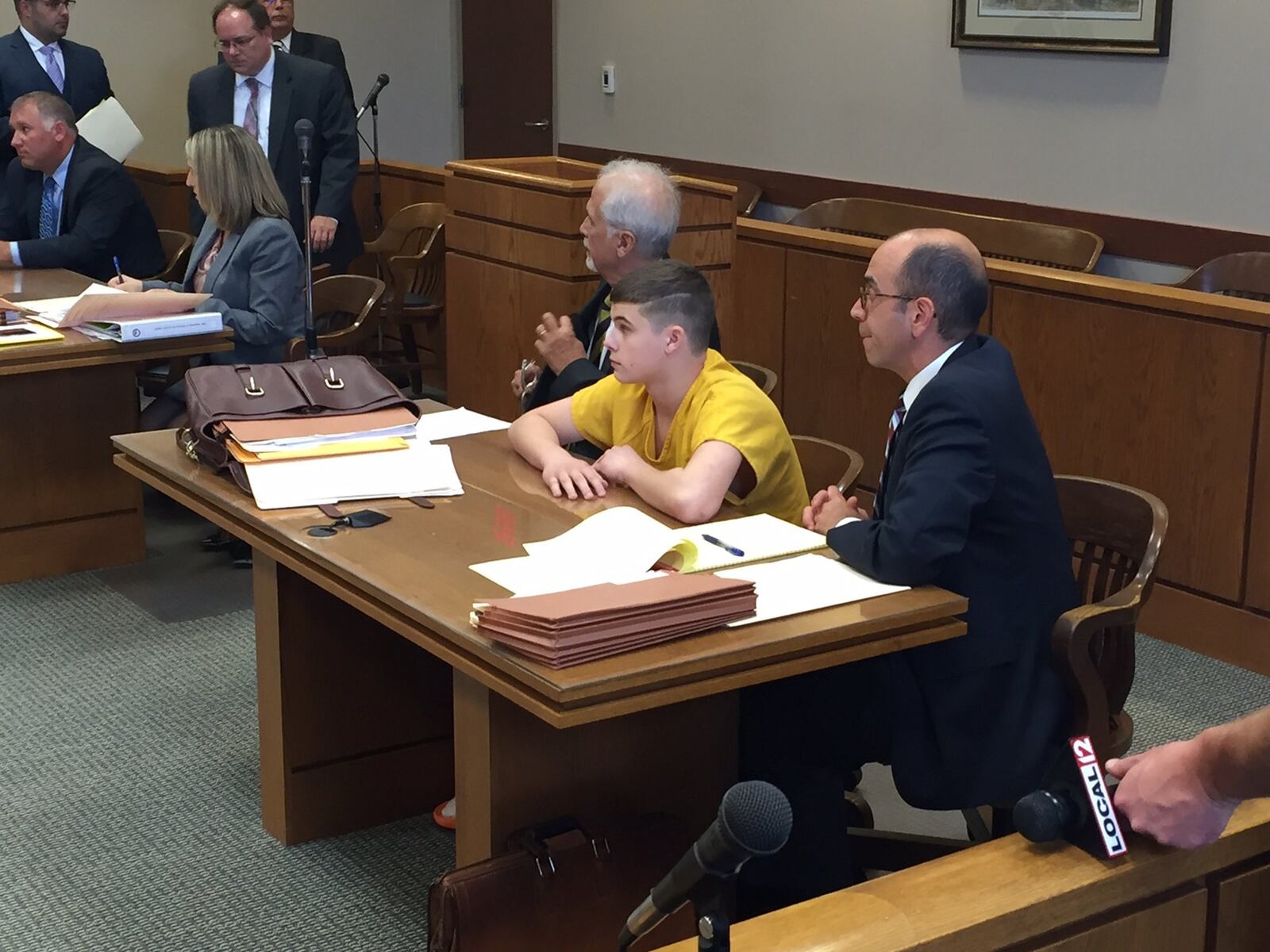 Austin Hancock sits with his attorneys during sentencing for the Madison School shooting.