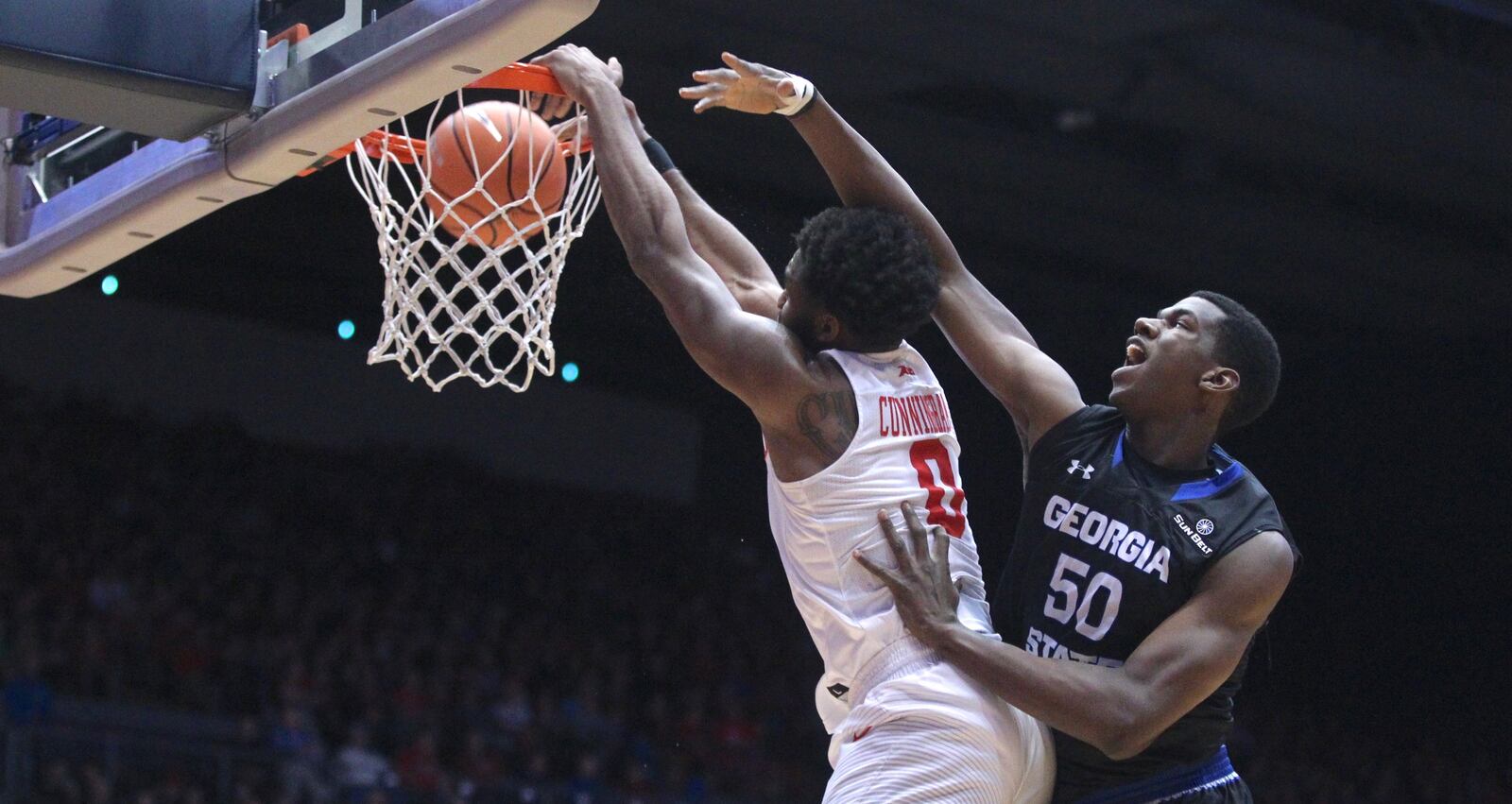 Dayton's Josh Cunningham dunks against Georgia State on Saturday, Dec. 16, 2017, at UD Arena.