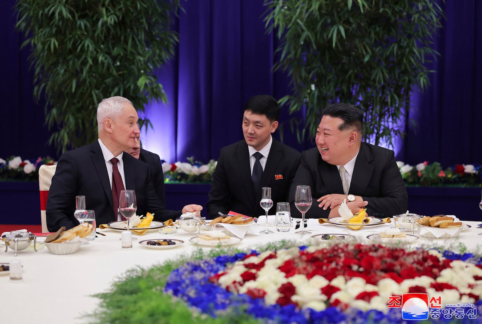 In this photo provided by the North Korean government, North Korean leader Kim Jong Un, right, and Russian Defense Minister Andrei Belousov, left, talk during a banquet to welcome Russian military delegation in Pyongyang, North Korea Friday, Nov. 29, 2024. Independent journalists were not given access to cover the event depicted in this image distributed by the North Korean government. The content of this image is as provided and cannot be independently verified. Korean language watermark on image as provided by source reads: "KCNA" which is the abbreviation for Korean Central News Agency. (Korean Central News Agency/Korea News Service via AP)