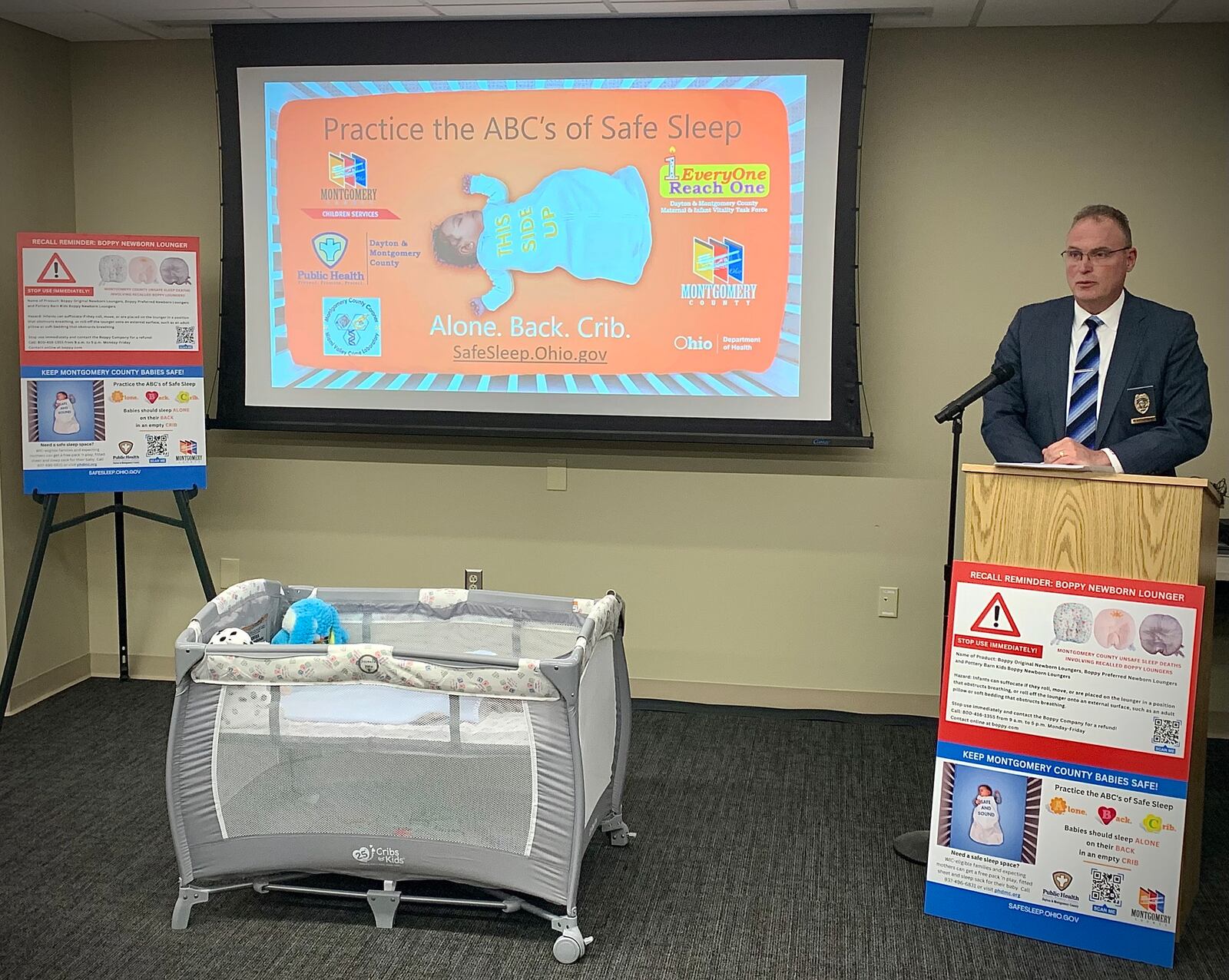 Montgomery County Coroner, Kent Harshbarger, talked about the practice of the ABC's of safe sleep for babies at a press conference Wednesday, May 10, 2023 on infant mortality in Montgomery County. MARSHALL GORBY\STAFF