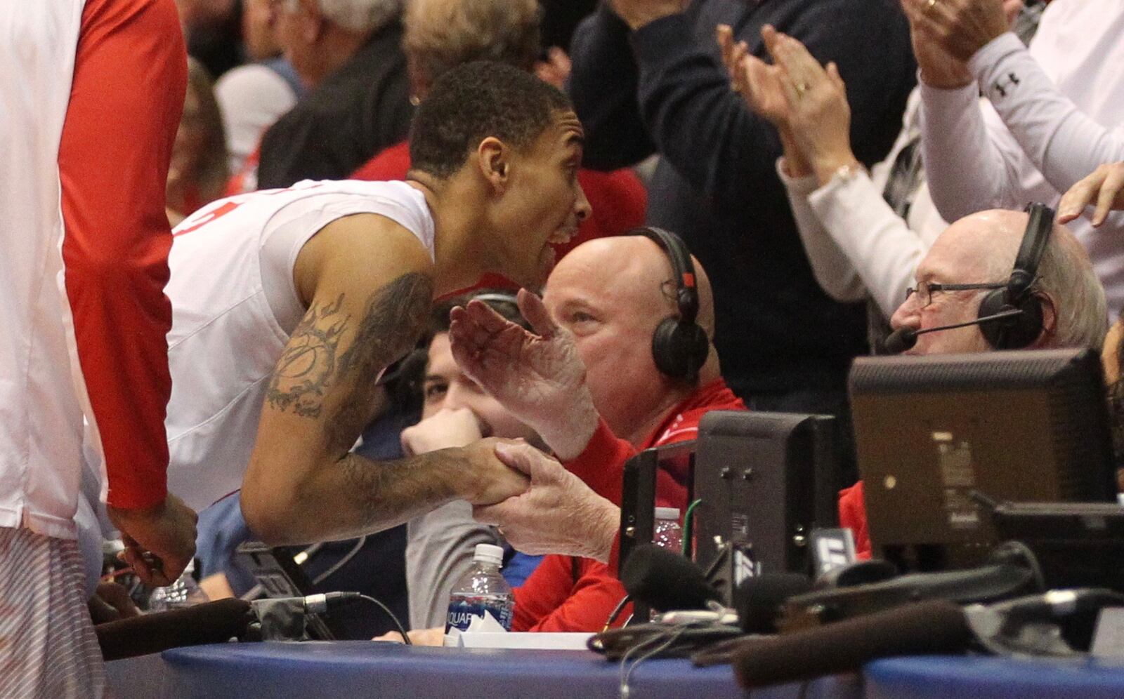 Kyle Davis talks to Bucky Bockhorn after the victory over Rhode Island on Jan. 6, 2017.