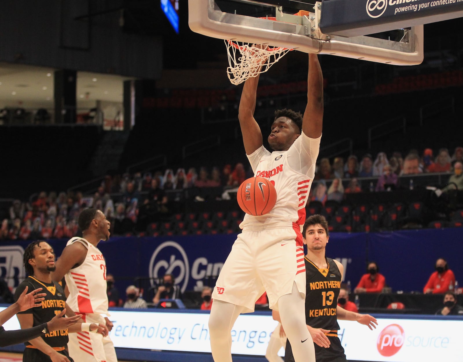 Dayton's Jordy Tshimanga dunks against Northern Kentucky on Tuesday, Dec. 8, 2020, at UD Arena. David Jablonski/Staff