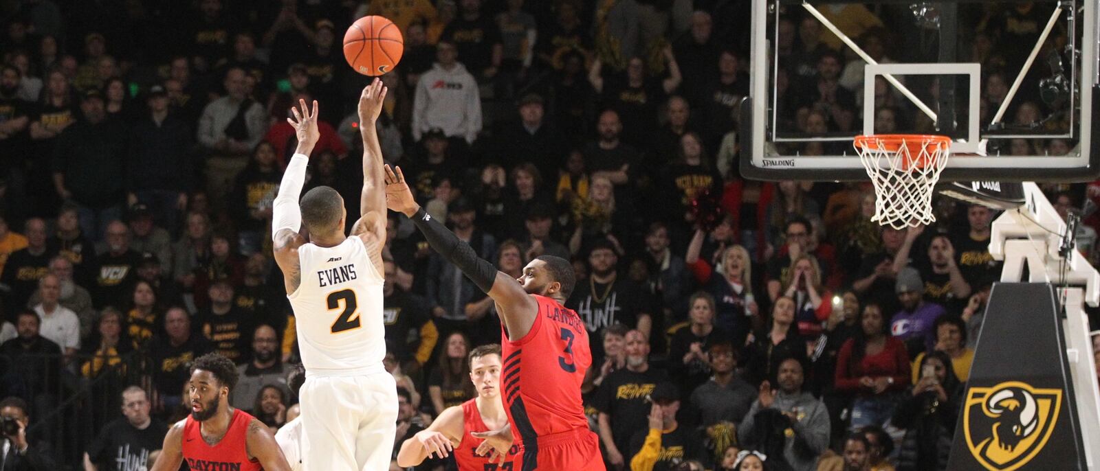 Virginia Commonwealth's Marcus Evans hits a go-ahead 3-pointer against Dayton with 33 seconds left on Wednesday, Jan. 16, 2019, at the Siegel Center in Richmond, Va.