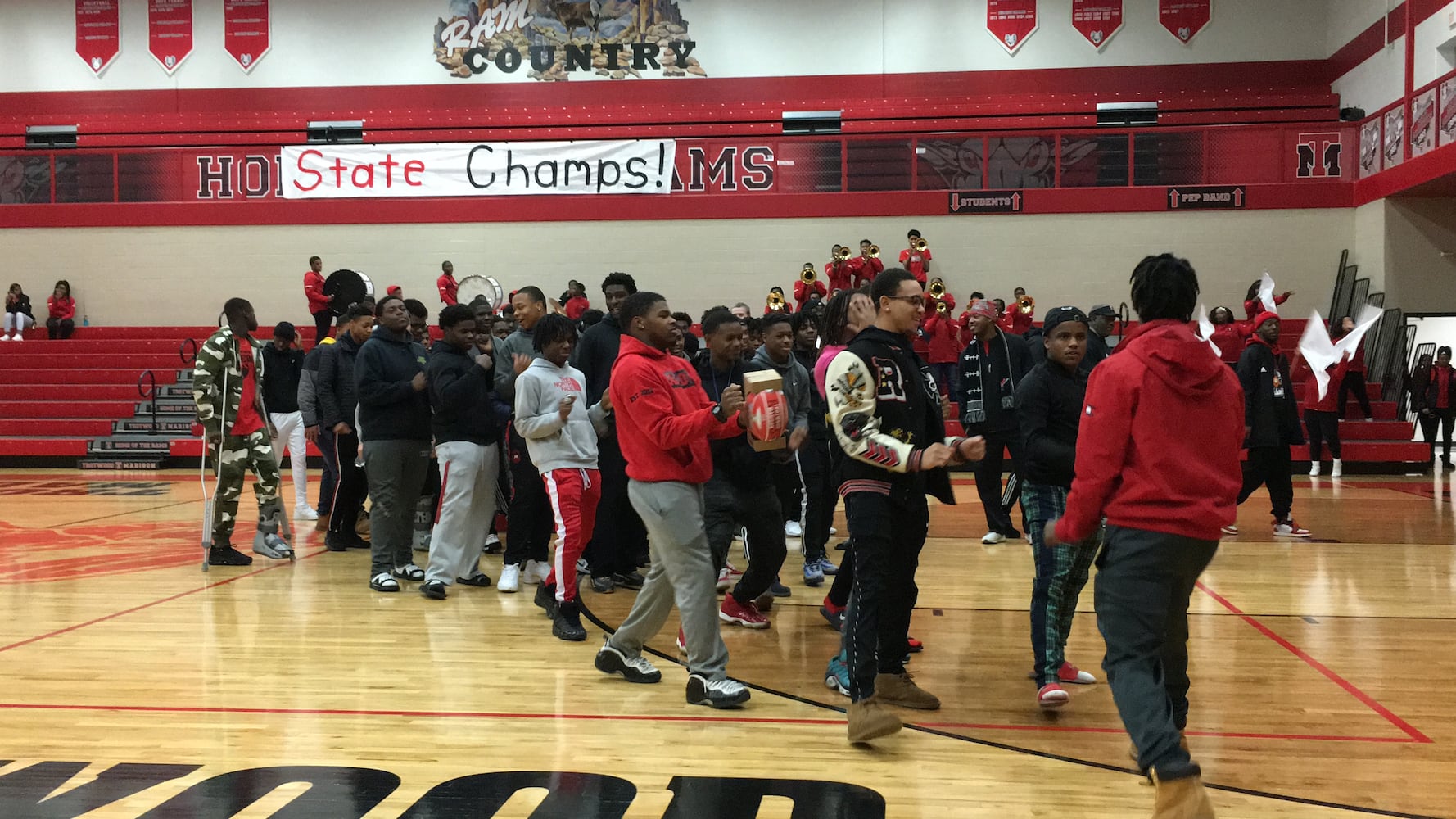 PHOTOS: Trotwood parents and fans welcome home football state champs at victory celebration