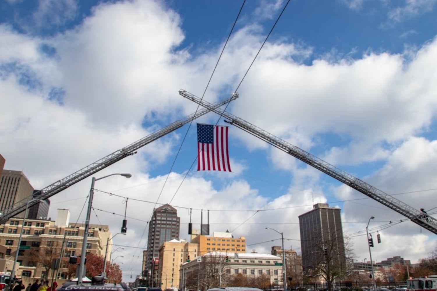 Firefighters put U.S. flag across Third Street