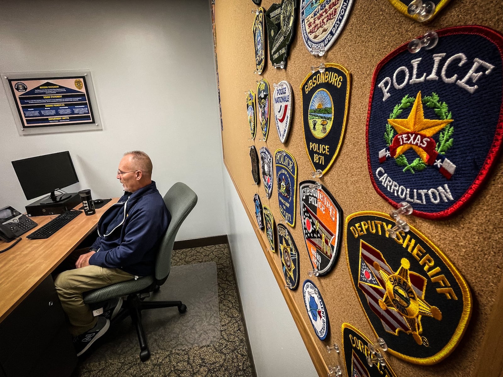 West Carrollton police detective, Robert Bell is the regional expert with electronic devises. JIM NOELKER/STAFF