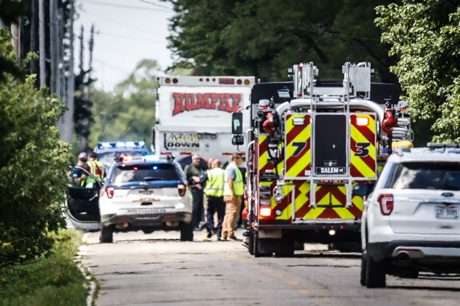 At least one person was taken to a local hospital following a crash on Friday, Aug. 12, 2022, involving a Rumpke waste collection truck on Little Richmond Road in Trotwood. JIM NOELKER / STAFF