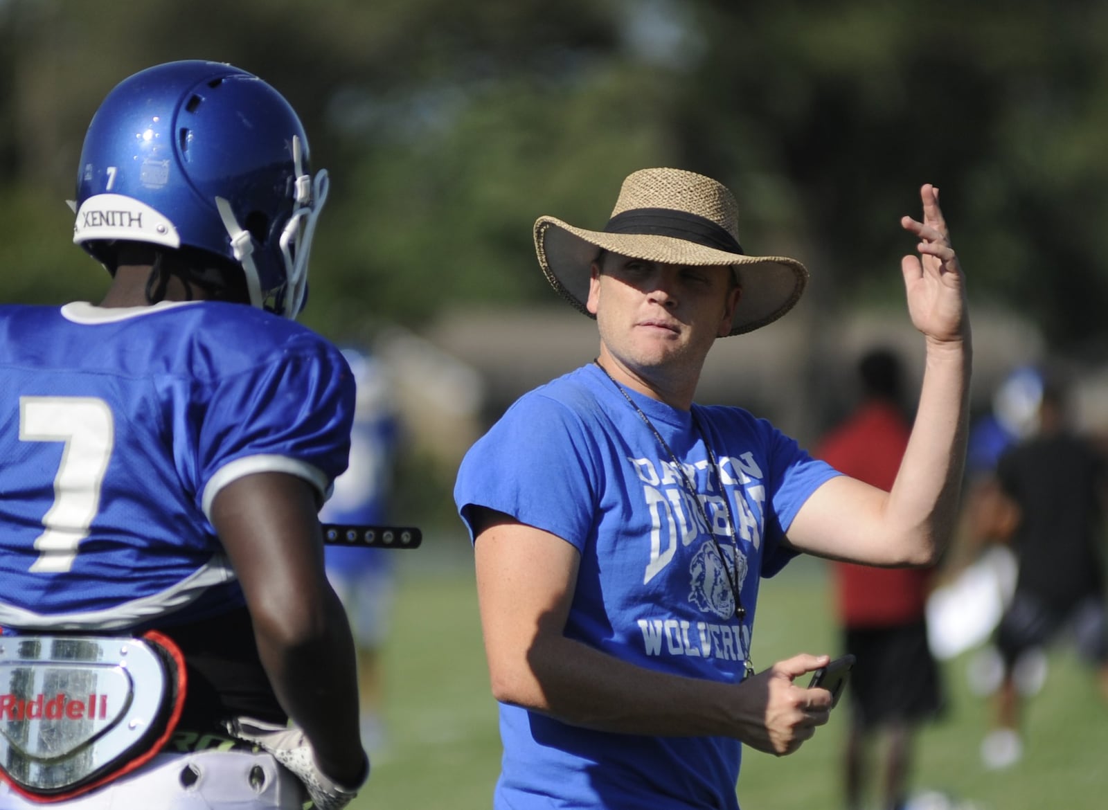 Corey Freed, in his first season as the new Dunbar High School head football coach, drills the Wolverines in preseason practice on Wednesday, Aug. 22, 2018. MARC PENDLETON / STAFF