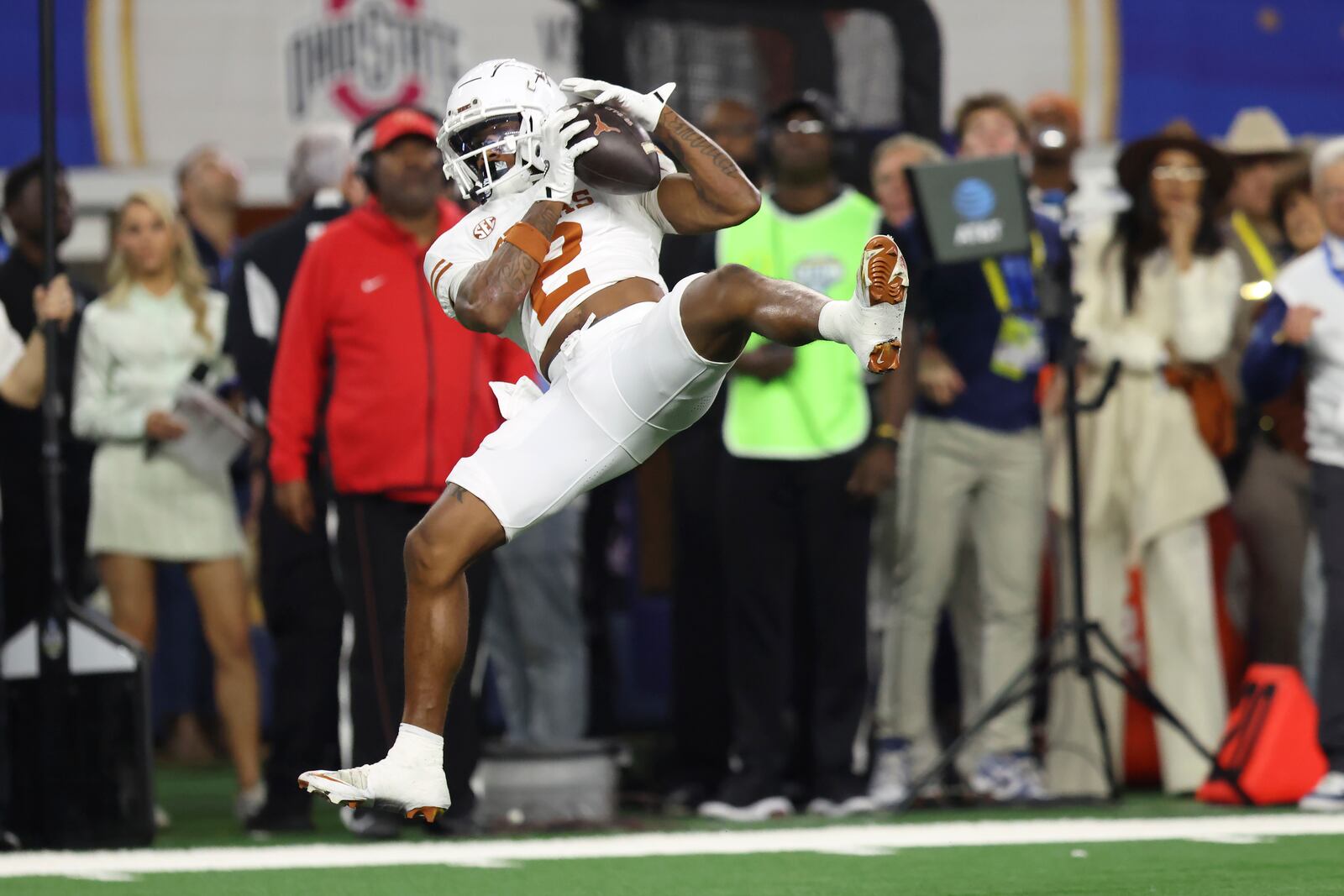 Texas wide receiver Matthew Golden catches a pass against Ohio State during the second half of the Cotton Bowl College Football Playoff semifinal game, Friday, Jan. 10, 2025, in Arlington, Texas. (AP Photo/Gareth Patterson)