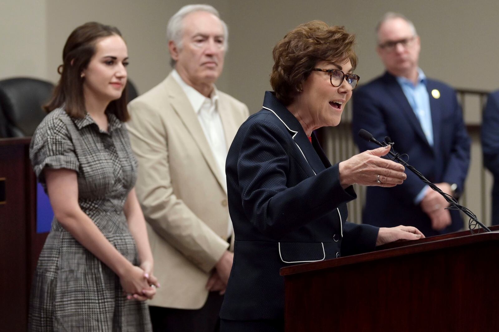 Sen. Jacky Rosen, D-Nev., delivers remarks, while her daughter Miranda Rosen, back left, and husband Larry Rosen listen, after winning re-election Saturday, Nov. 9, 2024, in Las Vegas. (Sam Morris/Las Vegas Review-Journal via AP)