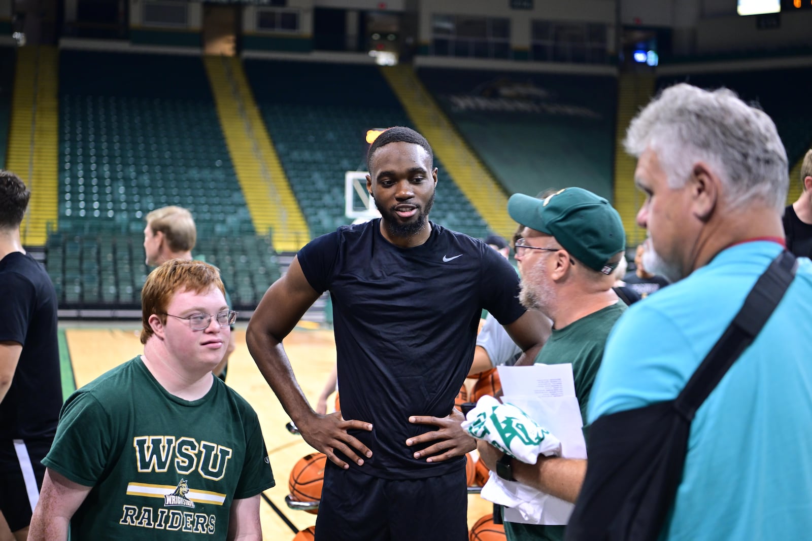 Wright State's Jack Doumbia talks to fans during a recent open practice. Joe Craven/Wright State Athletics