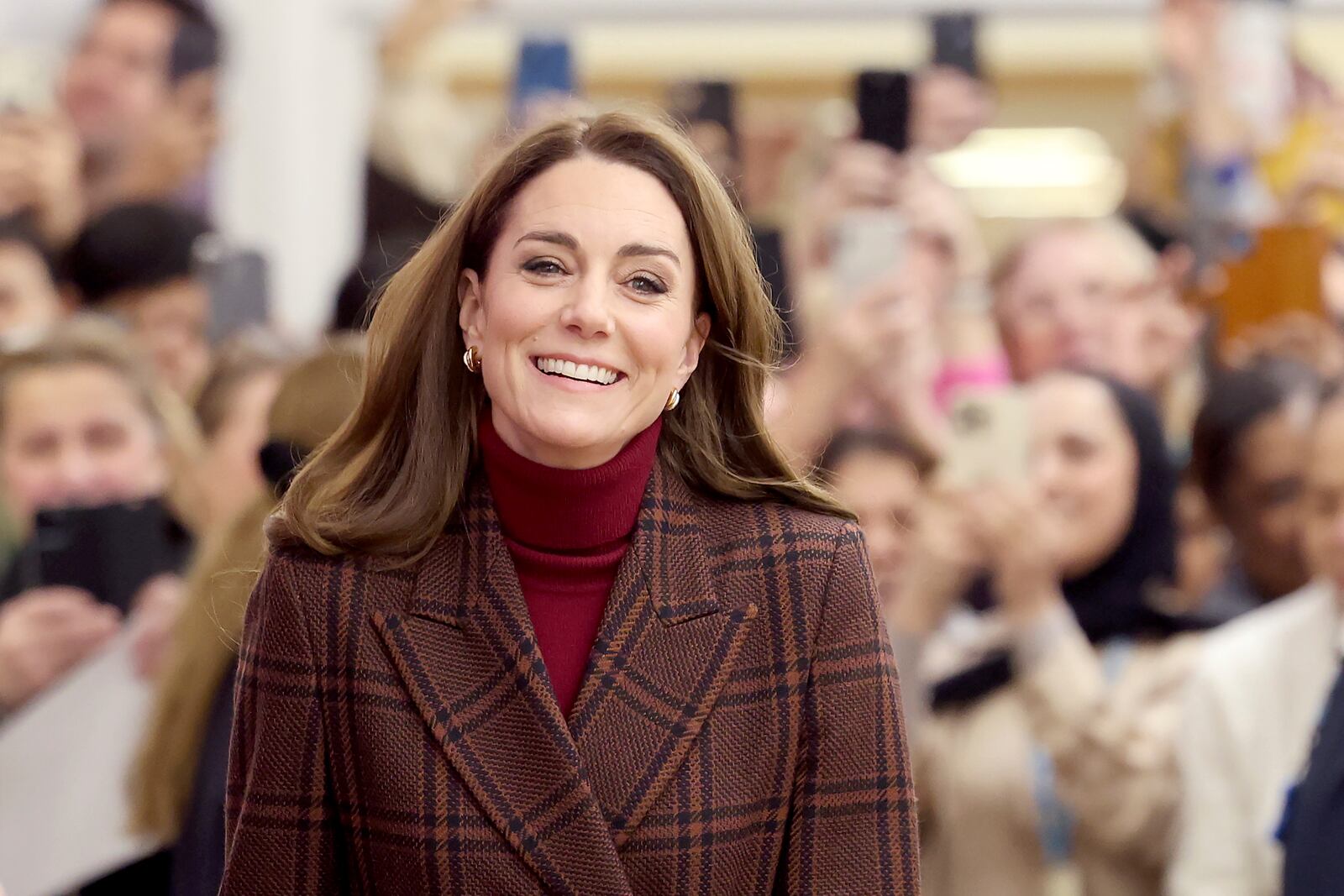 Britain's Princess Kate, center, visits The Royal Marsden Hospital, London, where she received her cancer treatment, Tuesday Jan. 14, 2025. (Chris Jackson/Pool Photo via AP)