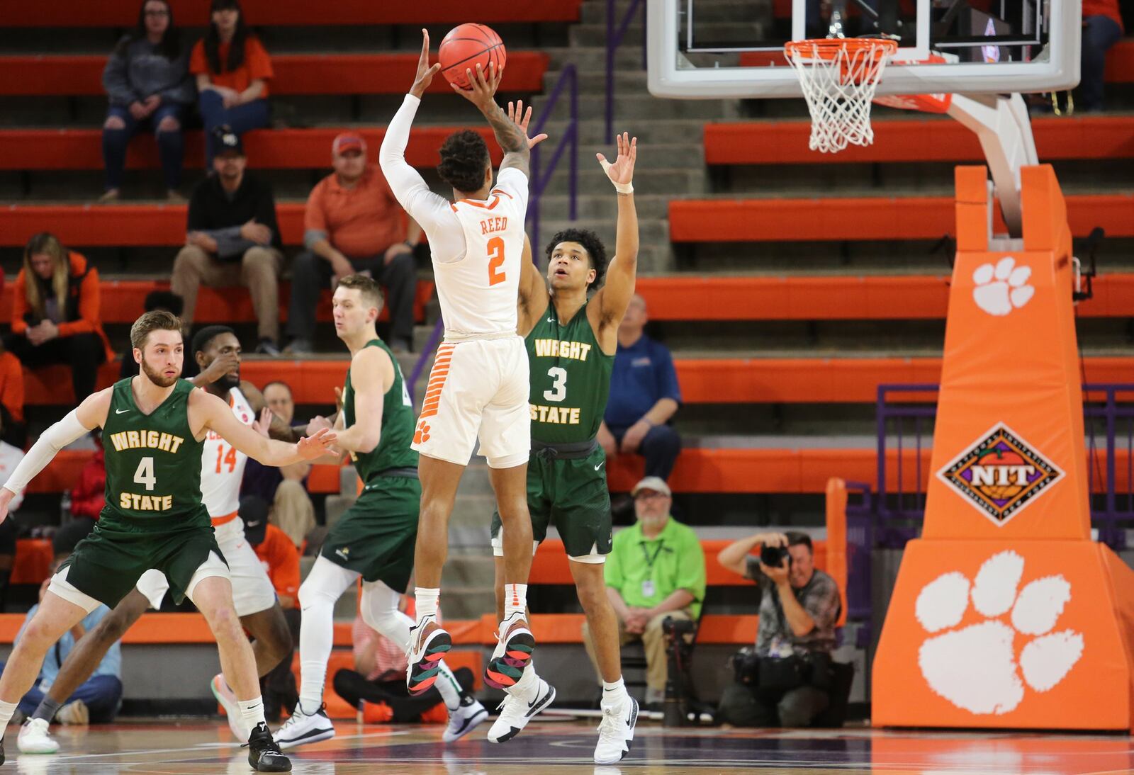 Wright State’s Mark Hughes (3) defends a shot by Clemon’s Marcquise Reed (2) during Tuesday night’s NIT game at Littlejohn Coliseum in Clemson, S.C. Clemson won 75-69. PHOTO COURTESY OF CLEMSON ATHLETICS