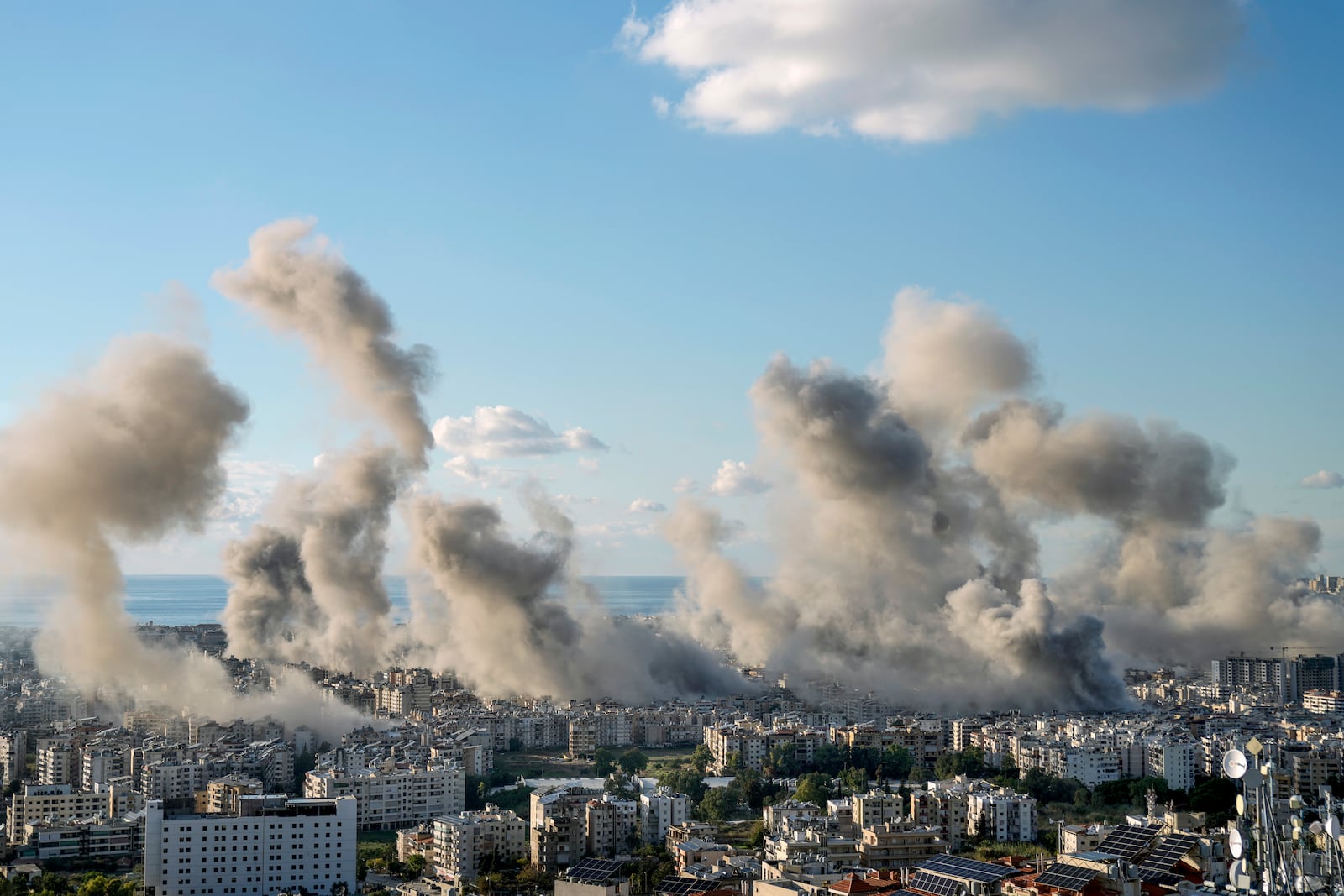 FILE - Smoke rises following an Israeli airstrike on Dahiyeh, in Beirut, Lebanon, Tuesday, Nov. 26, 2024. (AP Photo/Bilal Hussein, File)