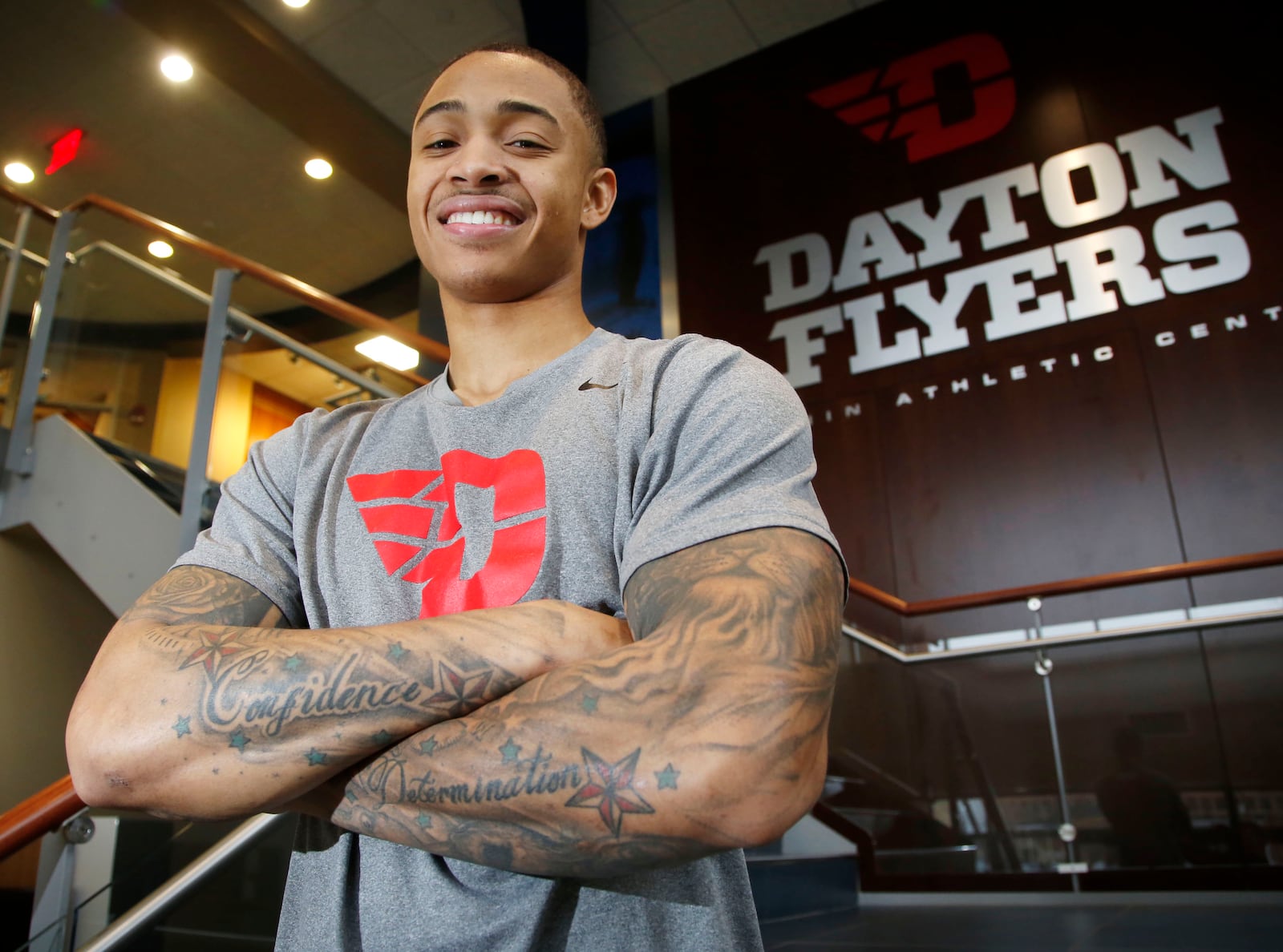 UD Flyers shooting guard Kyle Davis tells his life story through the tattoos he wears.  TY GREENLEES / STAFF