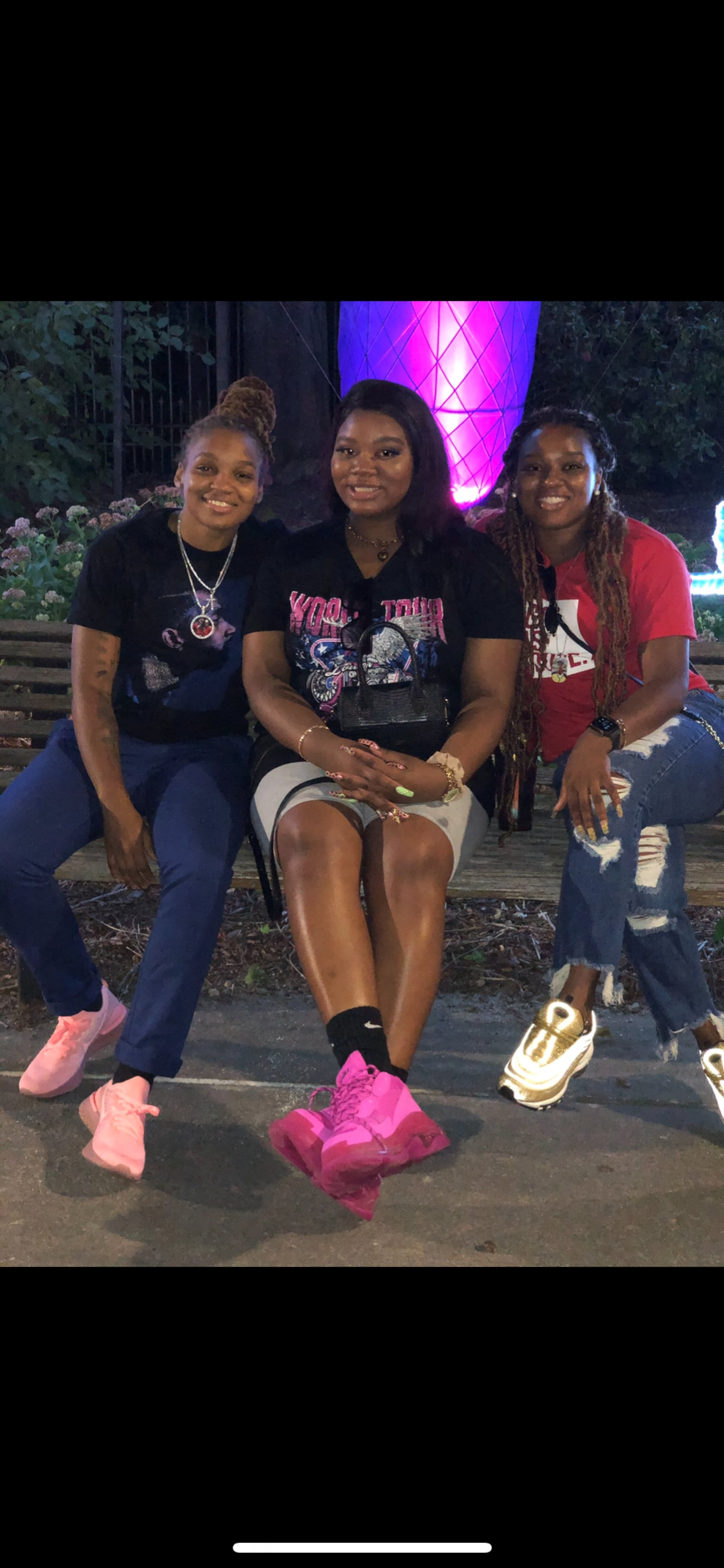 From left, Dayton Flyers senior guard Araion Bradshaw and her sisters Ariel and Amari. CONTRIBUTED