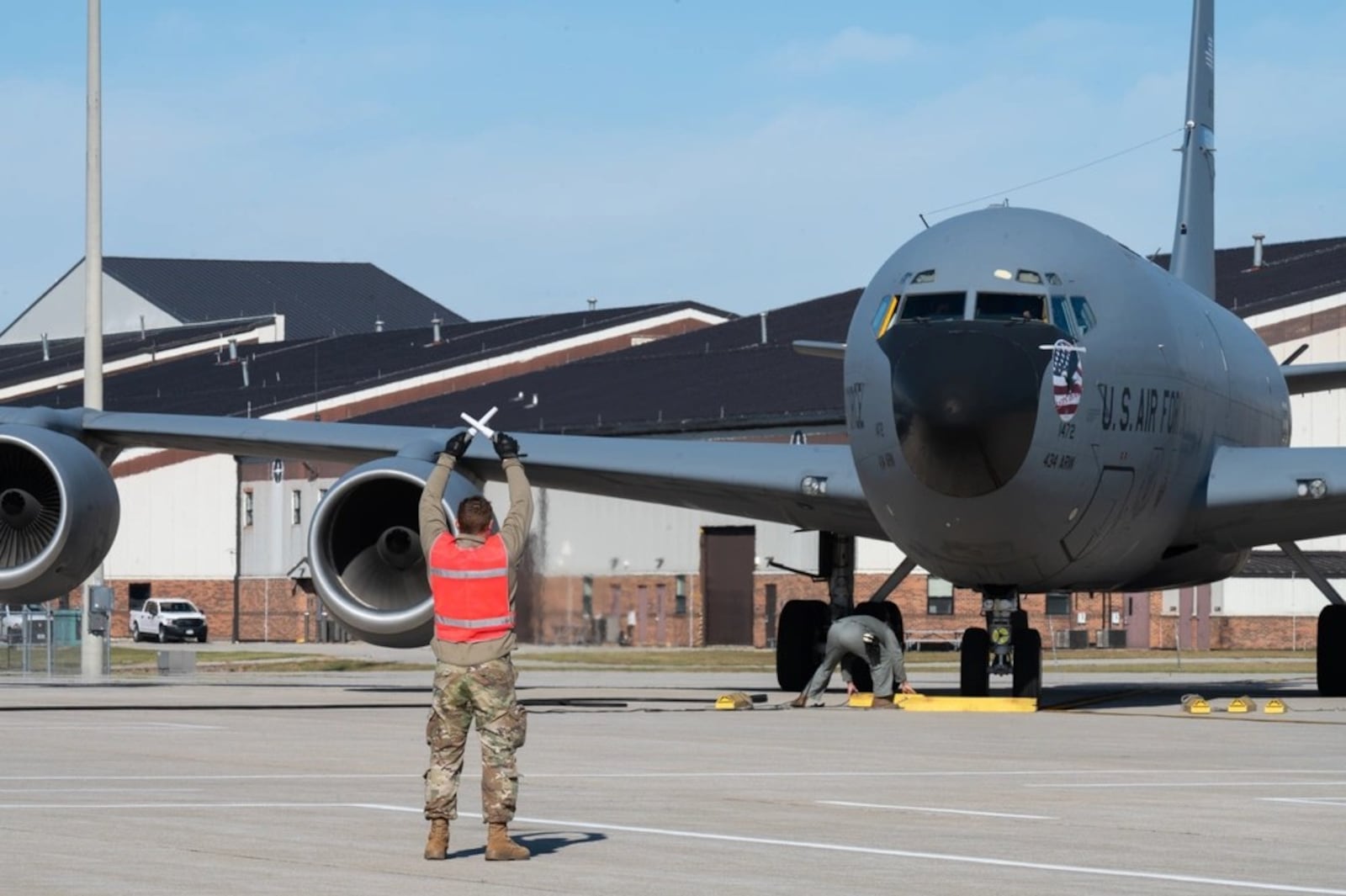 An airman assigned to the 434th Air Refueling Wing marshals in a KC-135R Stratotanker, Grissom Air Reserve Base, Indiana, Nov. 2, 2024. (U.S. Air Force photo by Senior Airman Alexis Morris)