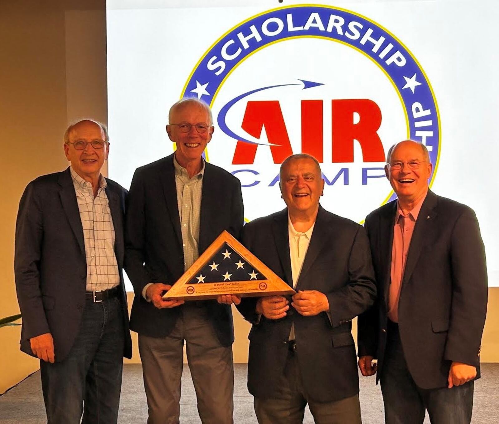 Air Camp's four founders in a recent photo. From left to right: Tom Lasley, Dan Sadlier, Vince Russo and retired Air Force Lt. Gen. Dick Reynolds. Contributed.