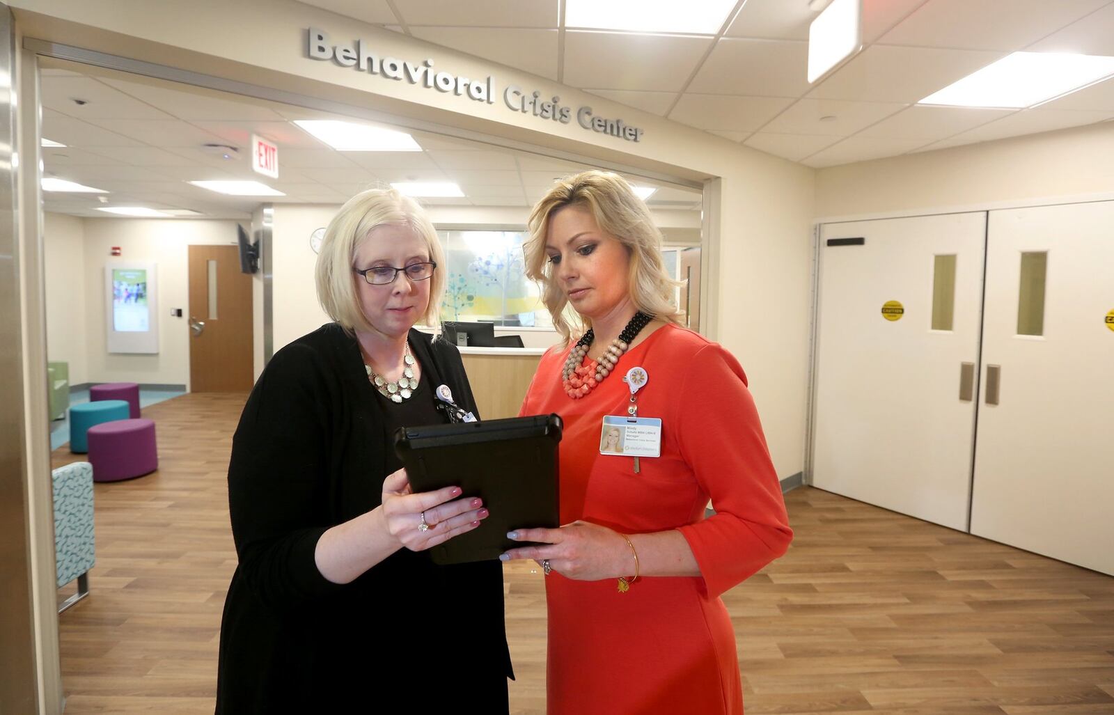 Dayton Children’s Behaviorial Crisis Center opened last year adjecent to the regular emergency department. It allows children with mental health needs to be seen in a safer, less chaotic envirnonment. Mindy Schultz (right) is the manager of the department and Lauryl Firman (left) is part of the department’s support staff. LISA POWELL / STAFF