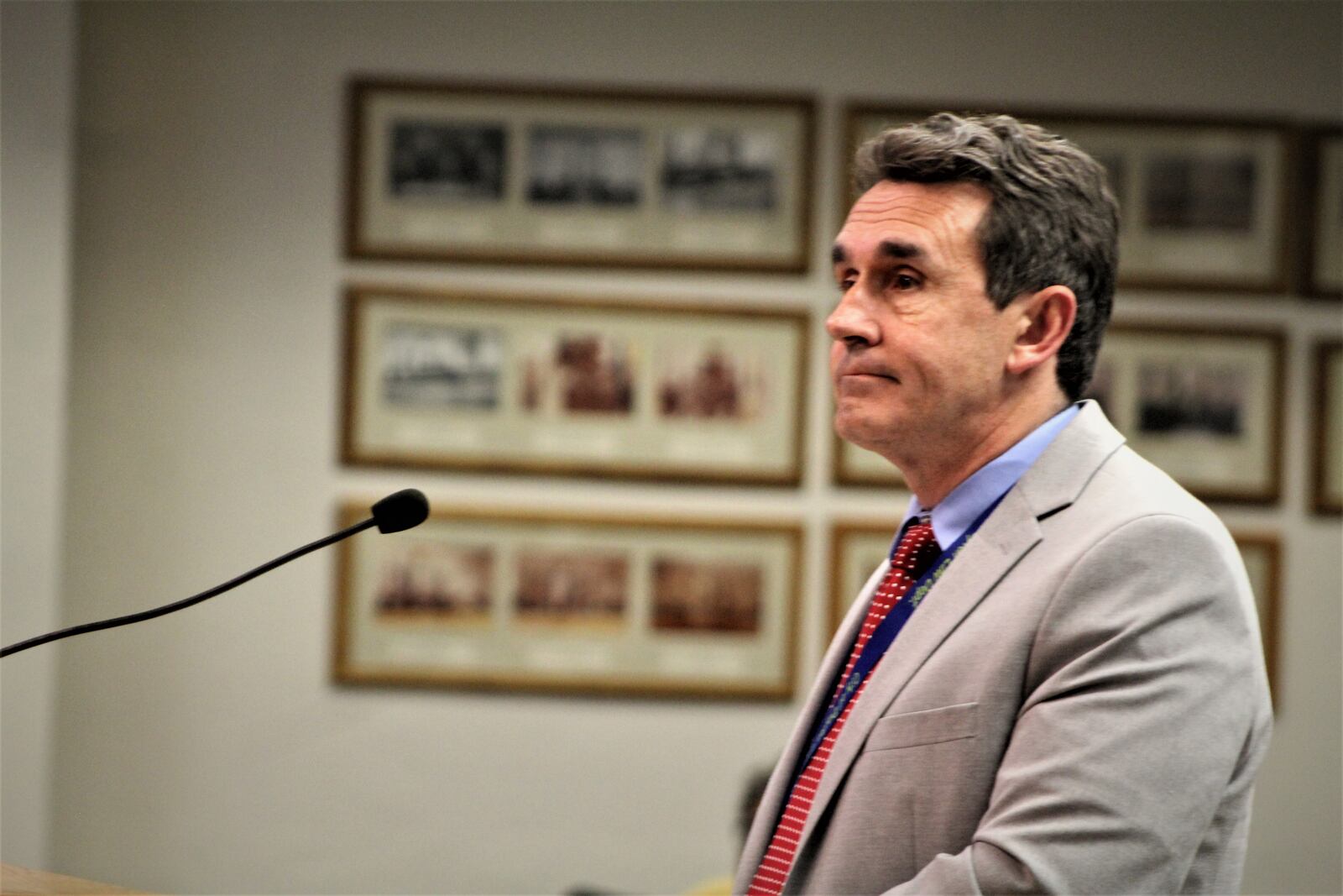 John Musto, Dayton's deputy law director,  gave a presentation about proposed measures to combat wage theft at a meeting on April 5, 2023. CORNELIUS FROLIK / STAFF