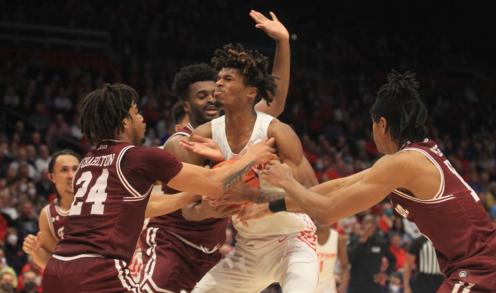 Dayton's DaRon Holmes II tries to protect the ball against Fordham on Tuesday, Jan. 25, 2022, at UD Arena. David Jablonski/Staff