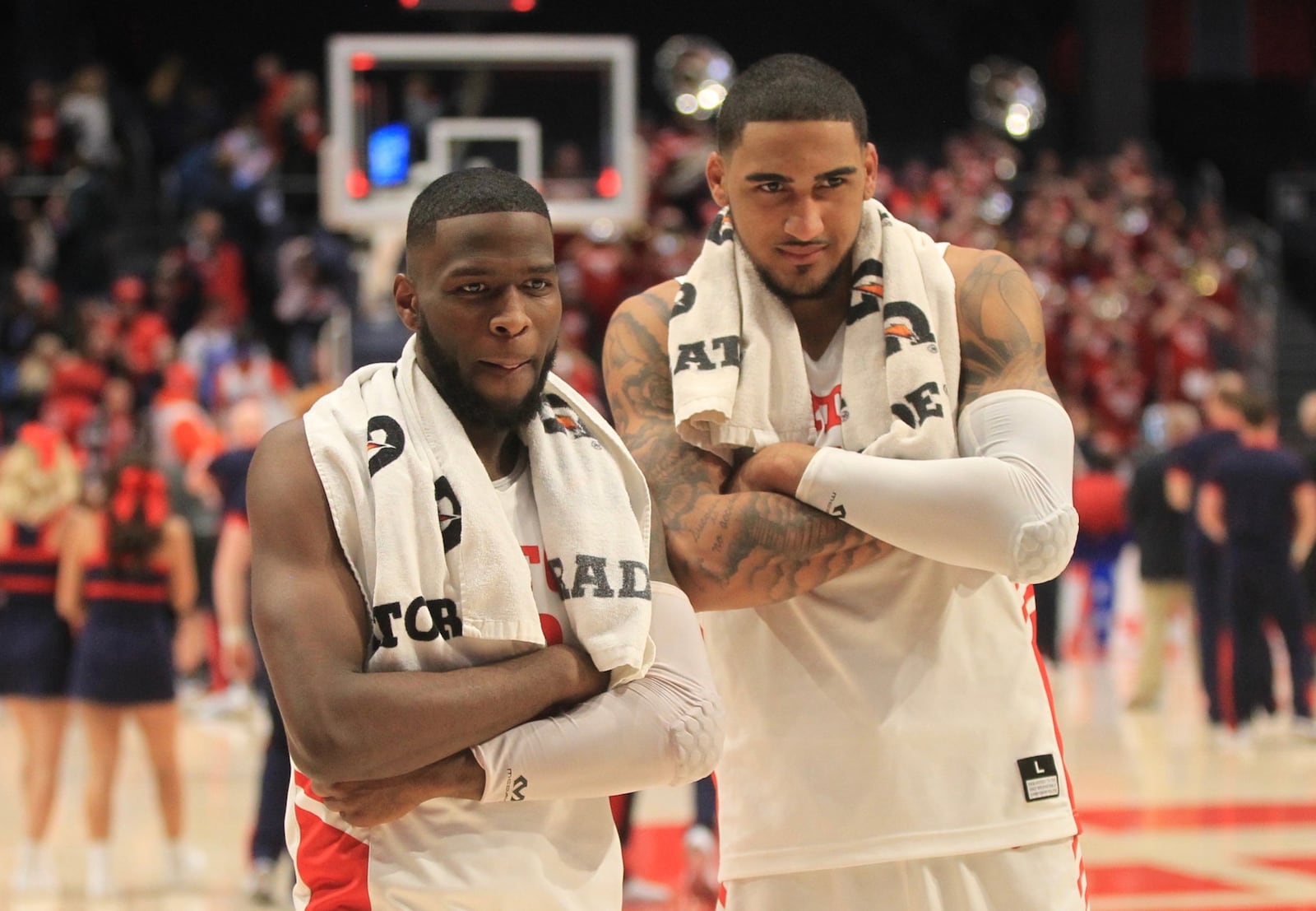 Dayton’s Jalen Crutcher and Obi Toppin pose for a photo after a victory against St. Bonaventure on Wednesday, Jan. 22, 2020, at UD Arena. David Jablonski/Staff