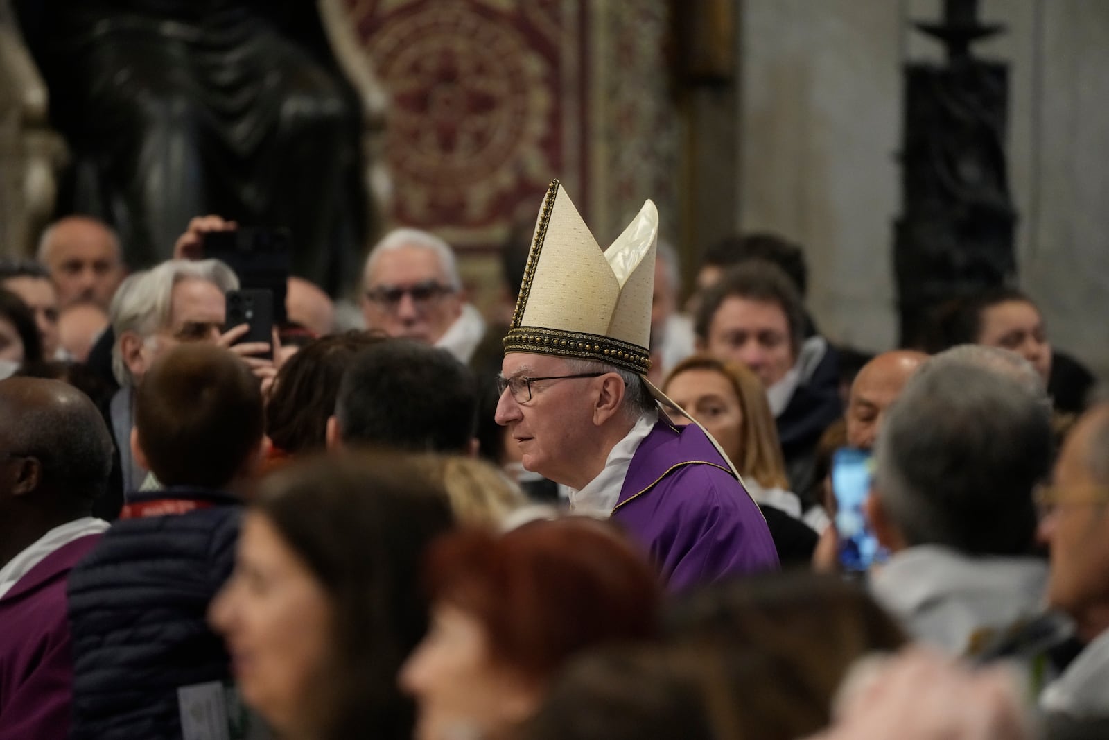 Vatican Secretary of State, Cardinal Pietro Parolin, delegated by Pope Francis who's being treated for pneumonia at Rome's Agostino Gemelli Polyclinic, presides over a mass with the pilgrims of the "Movement for Life" in St. Peter's Basilica at The vatican, Saturday, March 8, 2025. (AP Photo/Gregorio Borgia)