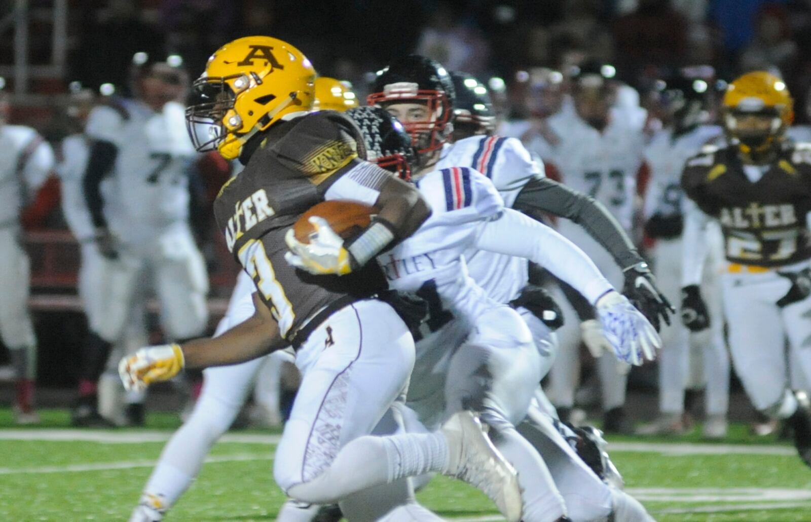 Alter's John Bivens returns a first-half kickoff 59 yards to set up a score. Alter played Columbus Bishop Hartley in a D-IV high school football state semifinal game at London on Friday, Nov. 25, 2016. MARC PENDLETON / STAFF