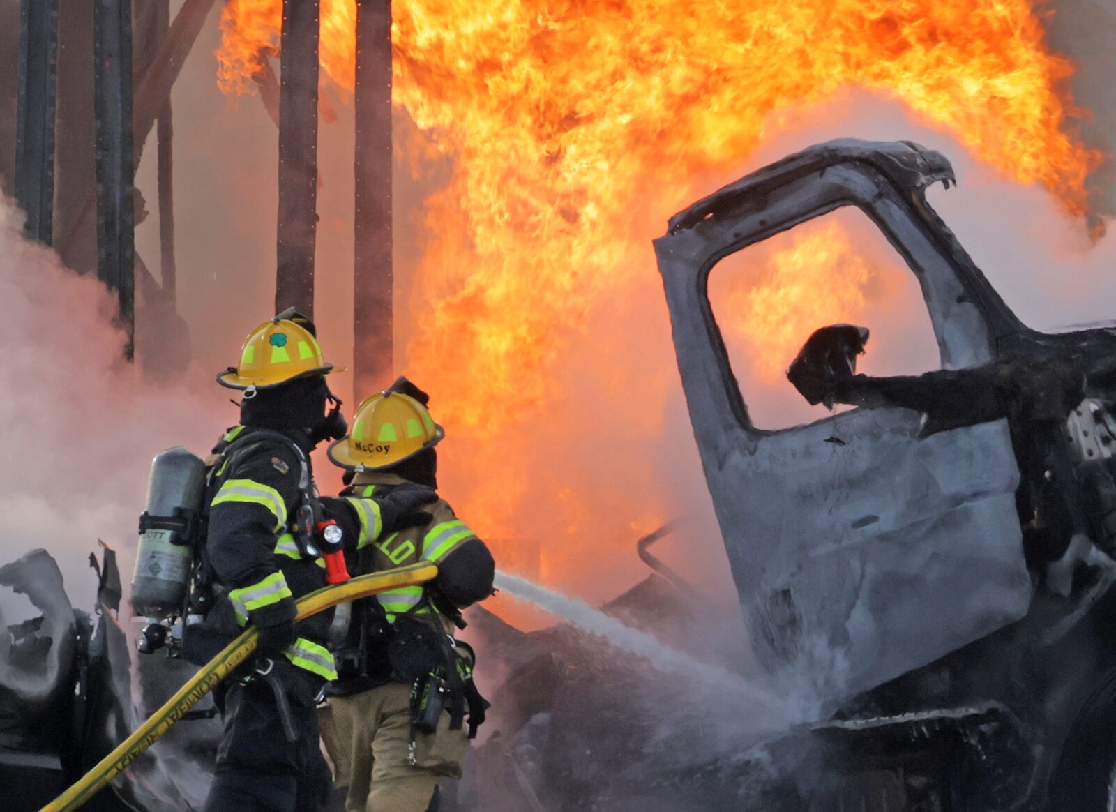 A semi truck and an SUV burst into flames after colliding on State Route 41 at the I-70 overpass Friday, Feb. 7, 2025. Both occupants escaped with minor injuries. Route 41 was closed for several hours while wreck was cleaned up. BILL LACKEY/STAFF