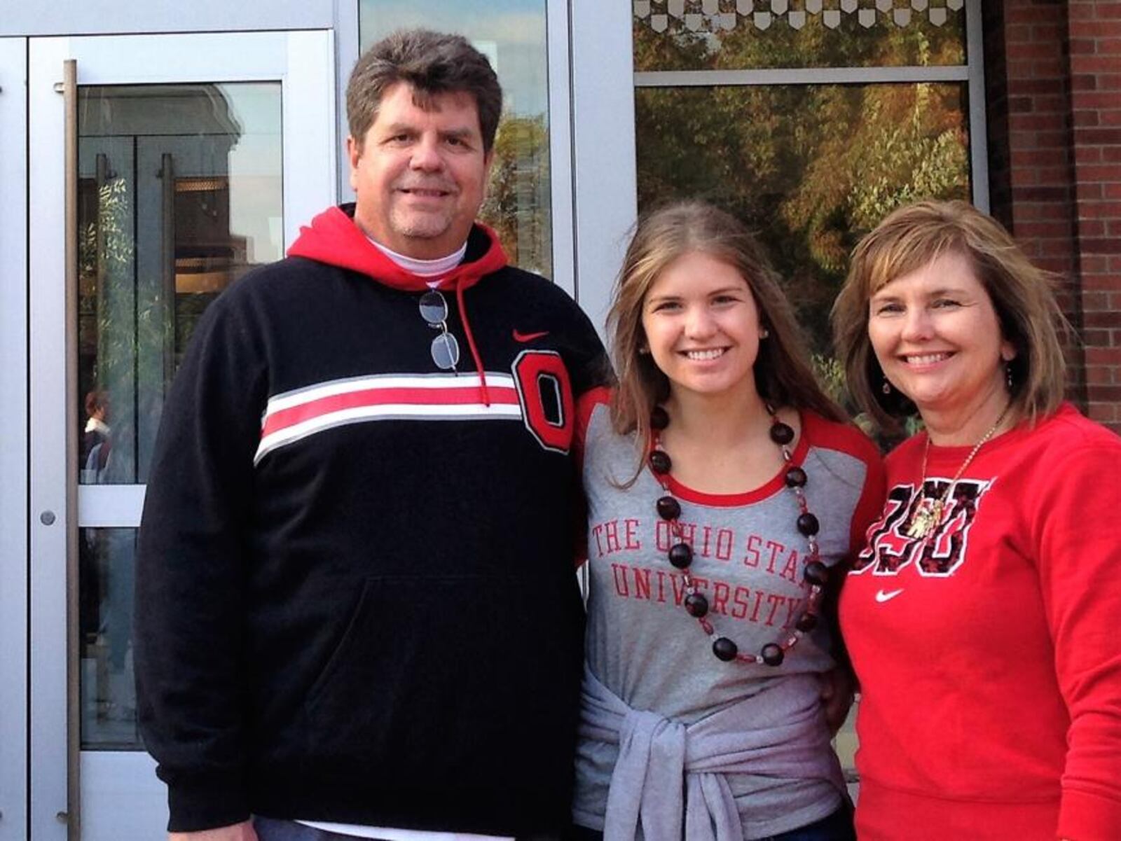 Julie Domicone (center) with parents Fred and Stacey Domicone.