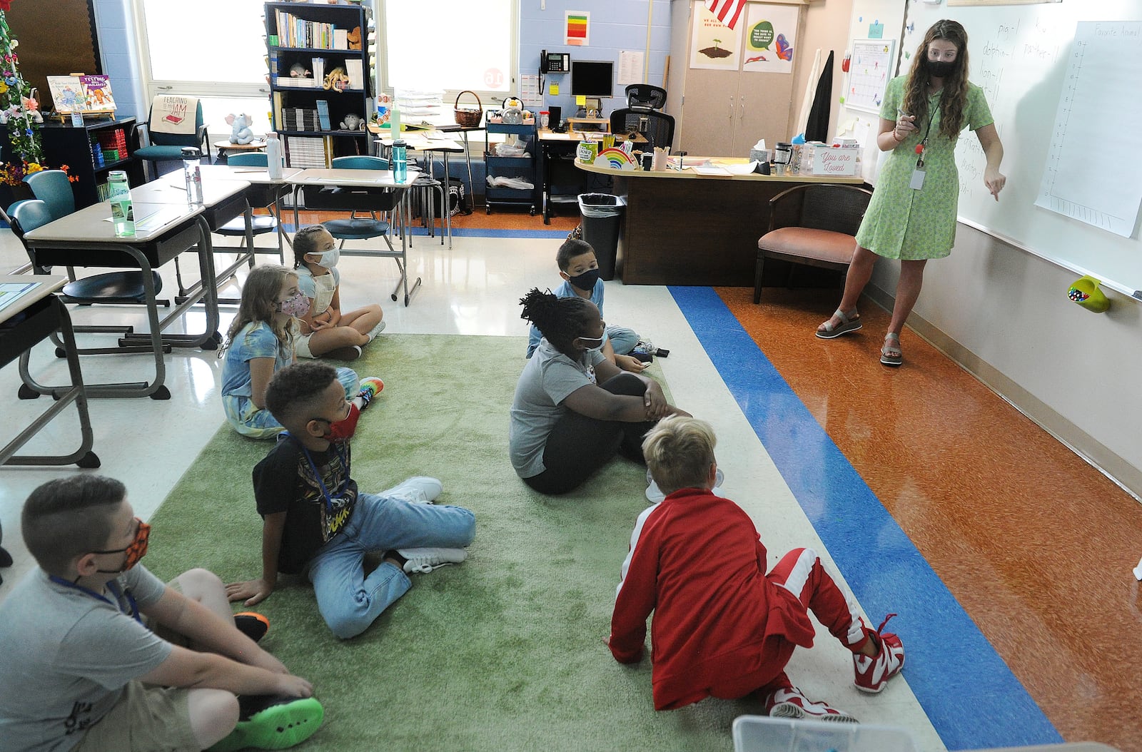 Virginia Stevenson Elementary, third grade teacher Tessler Baird works with students on the first day of school, Tuesday, 7, 2021. MARSHALL GORBY\STAFF