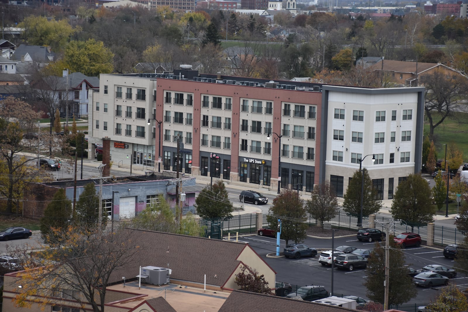 The first phase of the Flats at South Park housing project was completed in 2018. The four-story building, located along Warren Street near the University of Dayton campus, has 51 apartments and ground floor retail spaces. A second phase opened in the fall of 2021. CORNELIUS FROLIK / STAFF