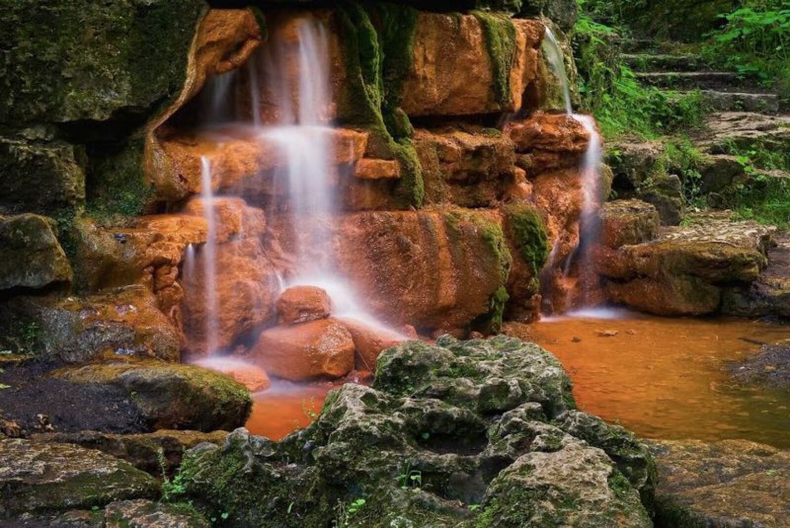 The actual springs in Yellow Springs at Glen Helen, a 1,000-acre nature preserve with 25 miles of trails, about 30 minutes from Dayton. The famous spring carries 60 gallons of iron-rich water to the surface every minute, according to Glen Helen.