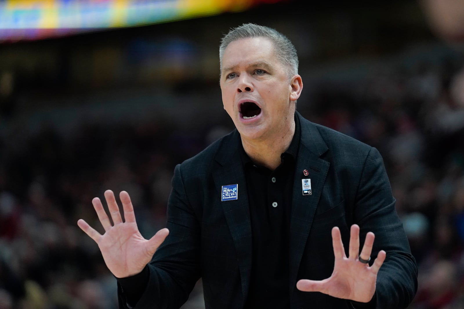 Ohio State head coach Chris Holtmann shouts during the first half of an NCAA semifinal basketball game against the Purdue at the Big Ten men's tournament, Saturday, March 11, 2023, in Chicago. (AP Photo/Erin Hooley)