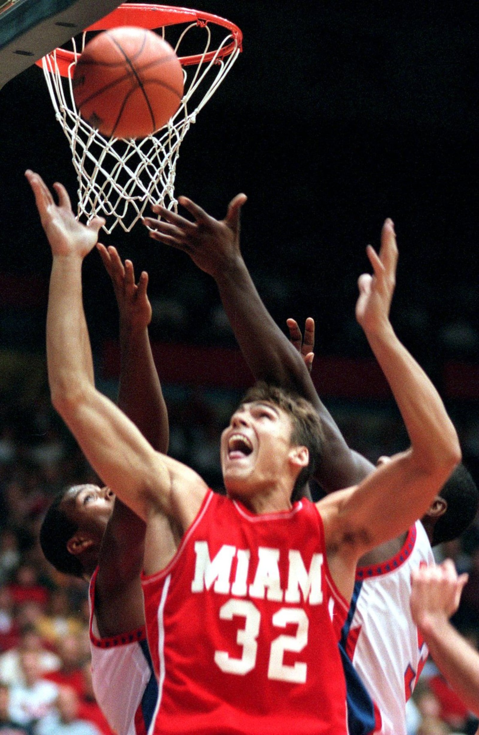 Miami’s Wally Szczerbiak grabs a rebound against Dayton during a game at UD Arena on Nov. 24, 1998. STAFF FILE PHOTO