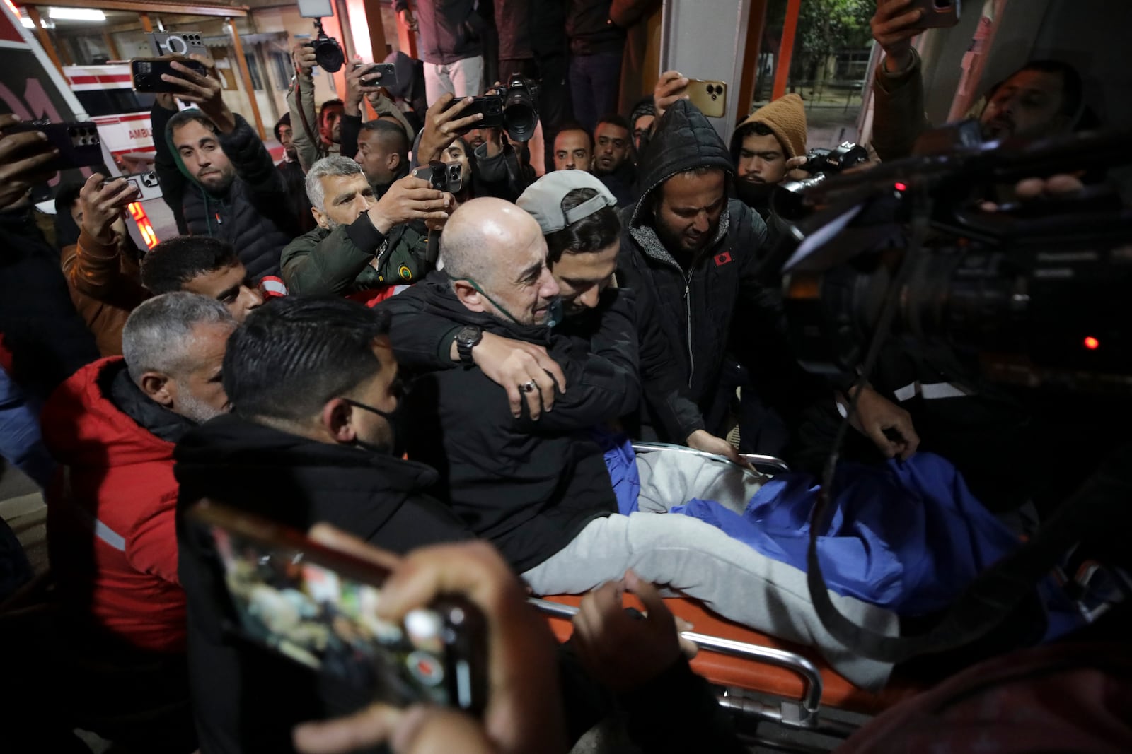 Freed Palestinian prisoners are greeted as they arrive in the Gaza Strip after being released from an Israeli prison following a ceasefire agreement between Hamas and Israel in Khan Younis, Gaza Strip, Thursday, Feb. 27, 2025. (AP Photo/Jehad Alshrafi)