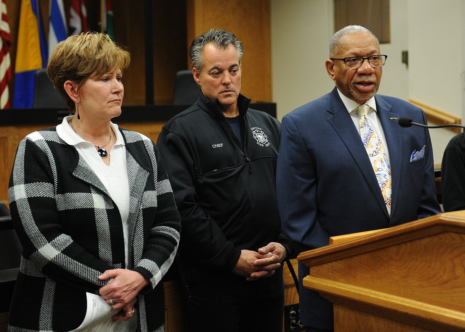 Dayton City Manager Shelley Dickstein, left Dayton Fire Chief Jeff Lykins and Mayor Jeffrey J. Mims at a press conference in 2023. MARSHALL GORBY\STAFF