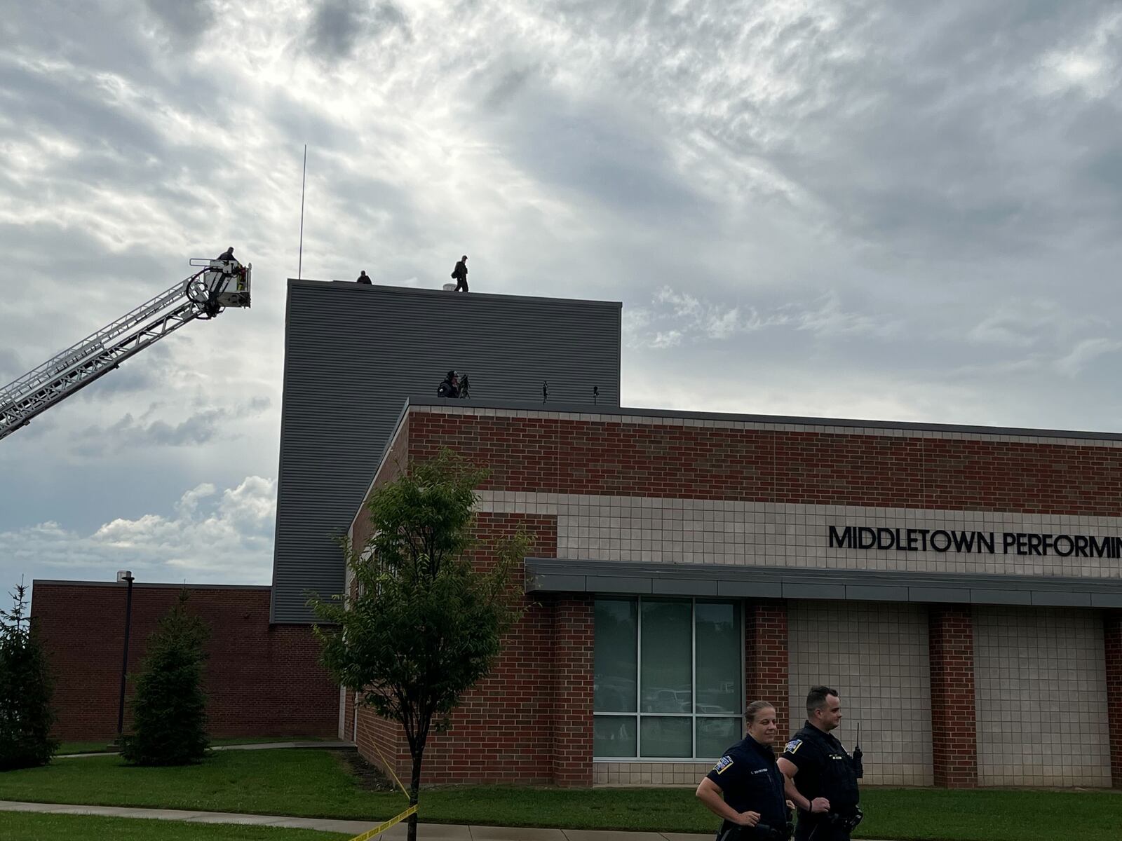 Security settles in on the roof as preparations are made for the JD Vance rally in MIddletown on Monday, July 22, 2024. TOM GNAU/STAFF