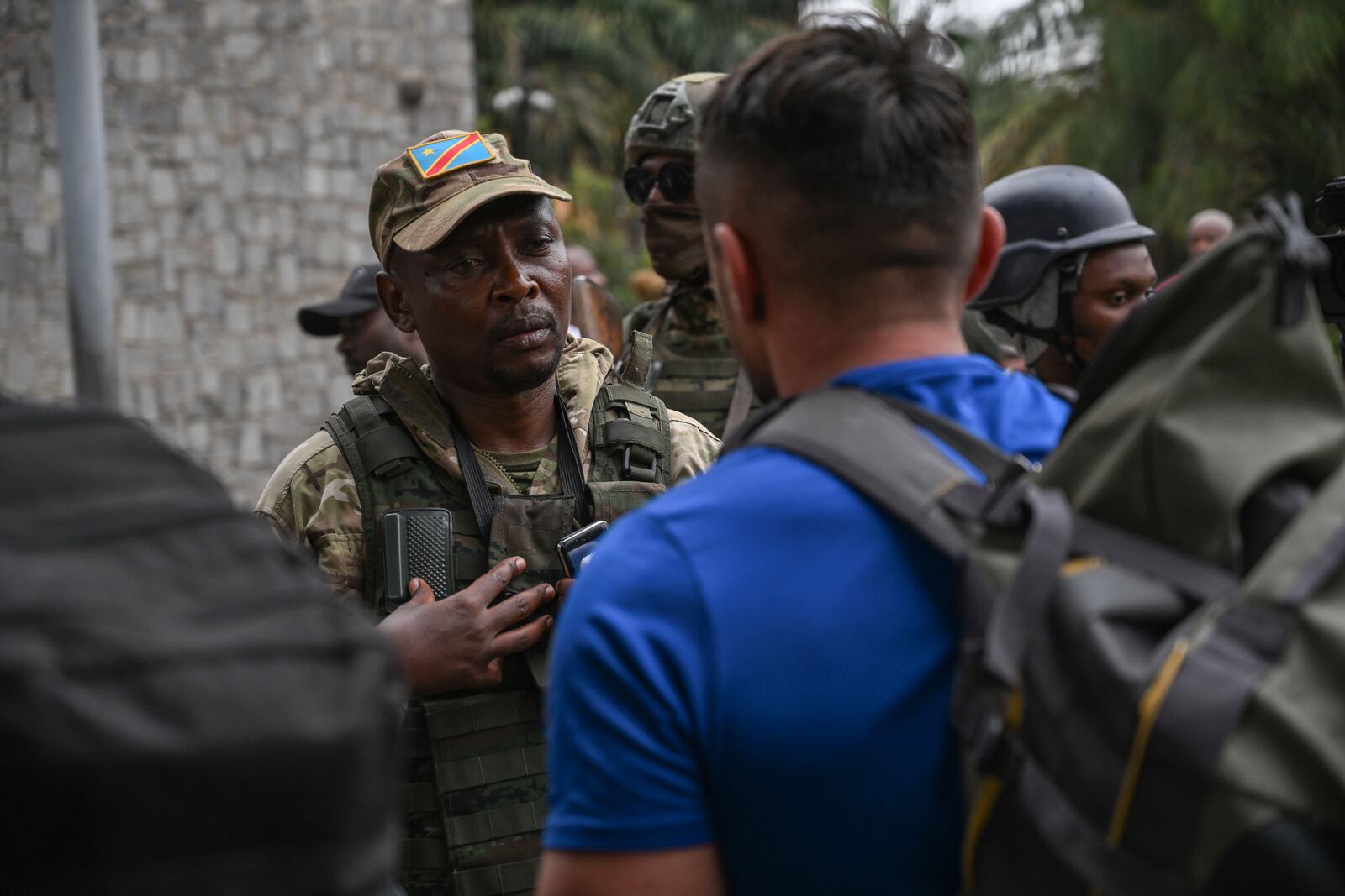 M23 rebels escort Romanian mercenaries to the border crossing into Rwanda in Goma, Democratic Republic of Congo, Wednesday, Jan. 29, 2025.(AP Photo/Moses Sawasawa)