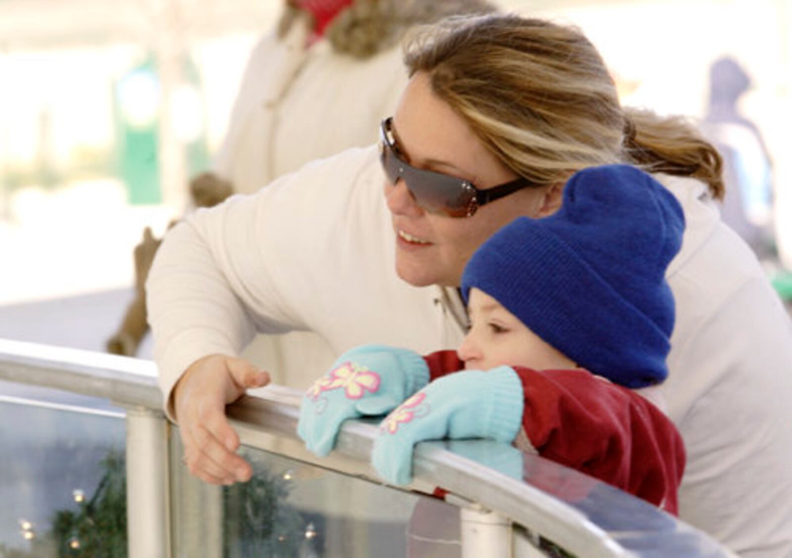 Anita (left) and Alyssa Blackman, 2 of Panama City, Florida at the new and improved outdoor ice rink at RiverScape MetroPark in downtown Dayton, Saturday, November 27, 2010. Beacuse it's under cover of the pavilion, the skating season will be extended to March 13, 2011.