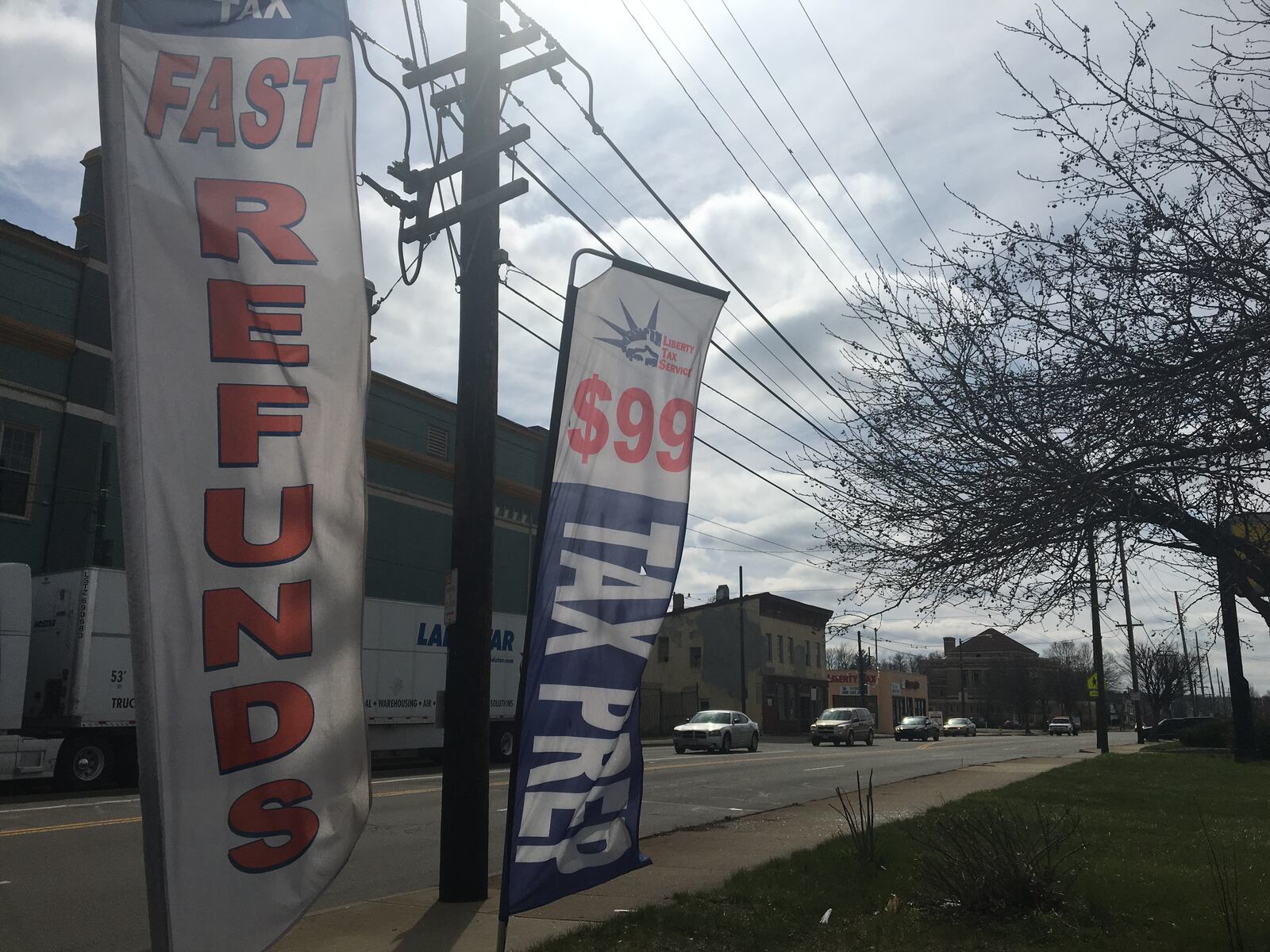 Advertisements for tax preparation services posted along West Third Street in West Dayton. ARCHIVE. CORNELIUS FROLIK / STAFF