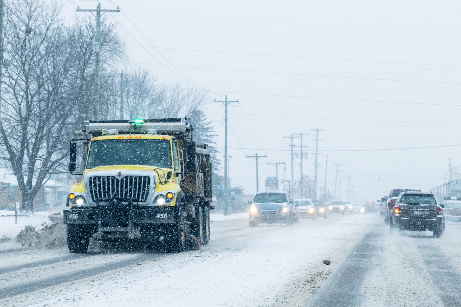 A city of Walker plow removes snow from Lake Michigan Drive in Walker, Mich., Friday, Jan. 10, 2025. (Joel Bissell/Kalamazoo Gazette via AP)