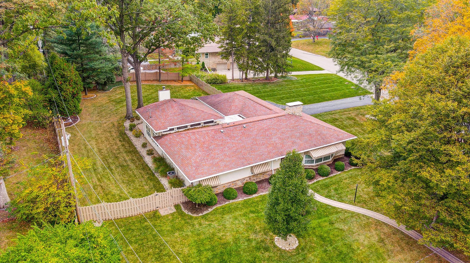 The home sits on a corner lot and has a fully fenced backyard.