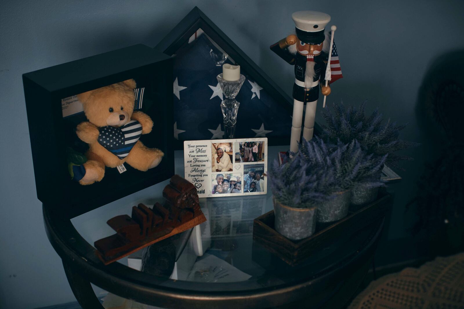 A memorial Sharline Volcy set up in honor of her husband, Ronald Donat, is seen Monday, Feb. 3, 2025, at her home in Orange, N.J. (AP Photo/Andres Kudacki)