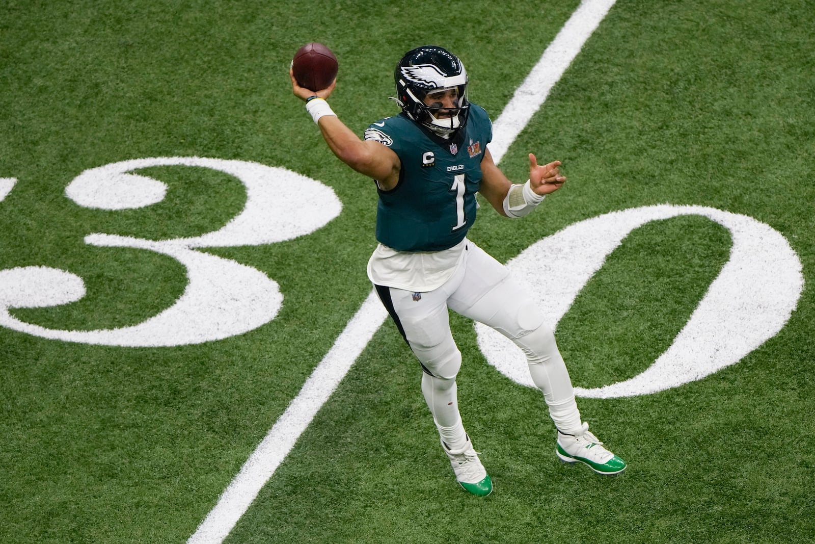 Philadelphia Eagles quarterback Jalen Hurts (1) passes against the Kansas City Chiefs during the second half of the NFL Super Bowl 59 football game, Sunday, Feb. 9, 2025, in New Orleans. (AP Photo/Charlie Riedel)