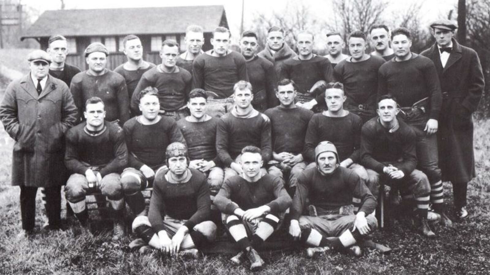 The Dayton Triangles football team (1920-1929) played in the first game for what is now known as the National Football League (NFL). The Triangles beat the Columbus Panhandles 14-0 on Oct. 3, 1920 in Dayton s Triangle Park. During the course of the game, the Triangles  Lou Partlow scored the first touchdown and George  Hobby  Kinderline kicked the point after, making NFL history. The Triangles were made up of weekend players, like most of the early NFL teams. Their manager Carl Storck participated in the formation of the NFL at Ralph Hays Hupmobile dealership in Canton in 1920; in 1921 he was named league secretary-treasurer; and in 1939 he became president of the NFL. In 1929 the Triangles franchise was sold and moved to Brooklyn, New York. The present-day Indianapolis Colts can trace their ancestry to the original Dayton Triangles. Although many relocations, name changes and thrilling NFL games have transpired since then, Dayton can be proud of the Triangles' role in the start of it all. (Inducted: 2008)