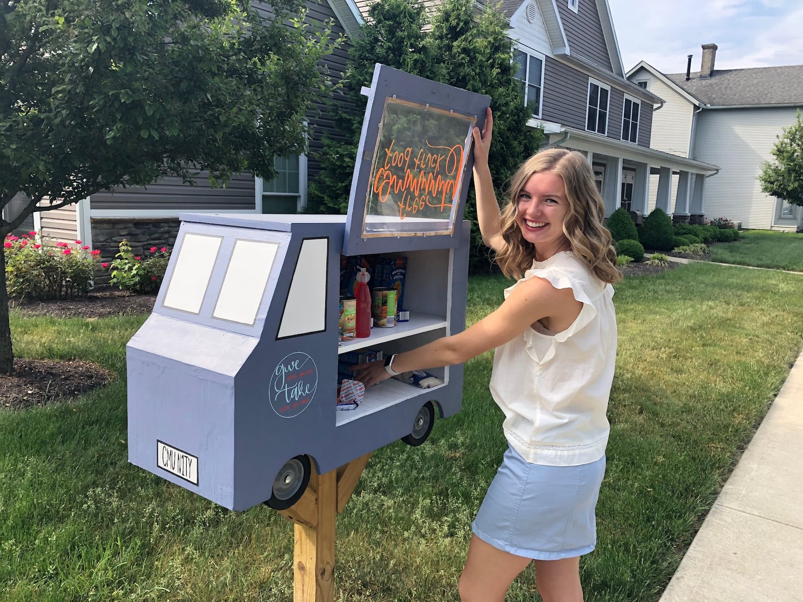 Troy Christian High School graduate Maiya Dilbone created the Community Food Truck blessing box charity effort in Miami County. JEREMY P. KELLEY / STAFF PHOTO