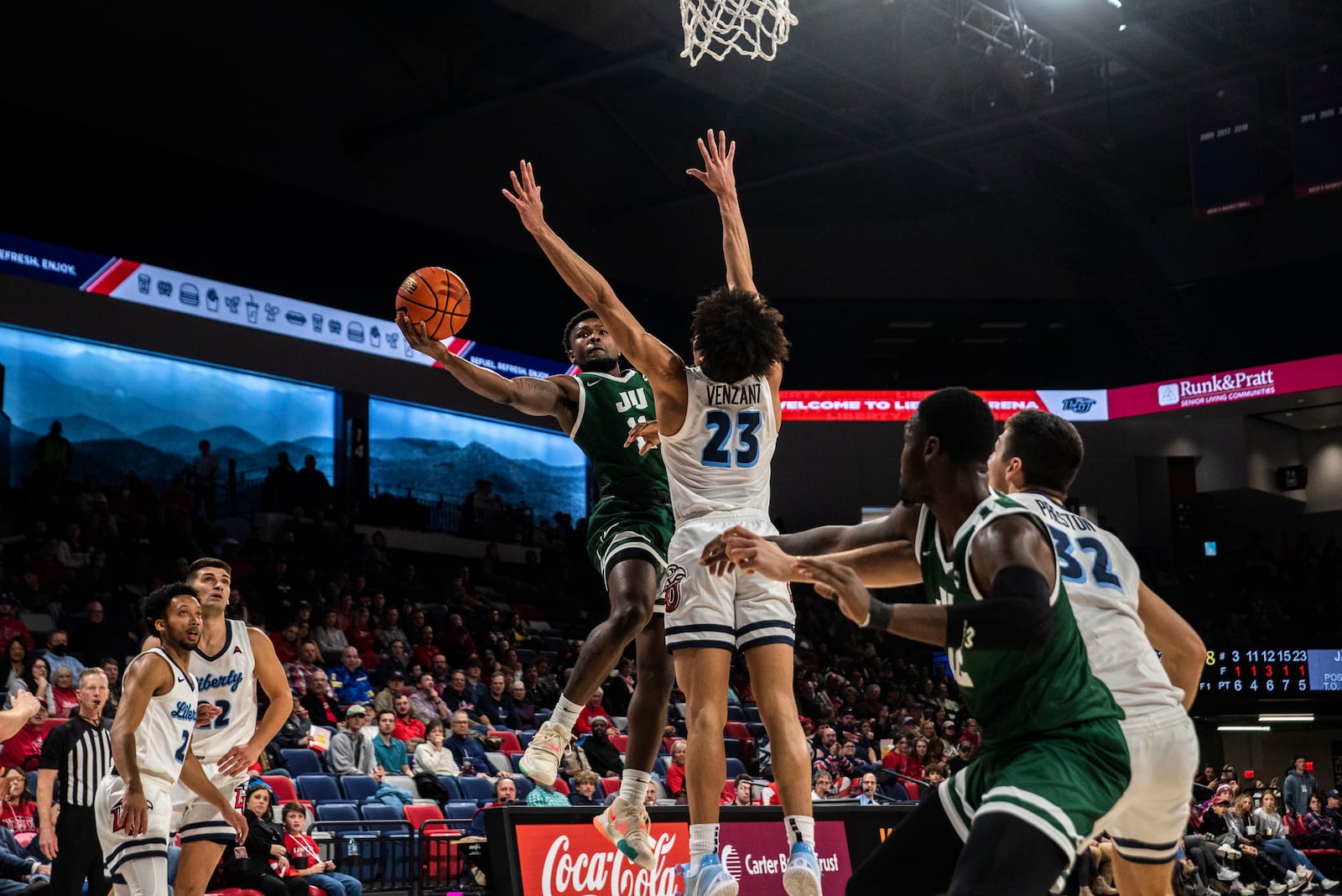 Jacksonville guard Jordan Davis (11) takes a shot during an NCAA college basketball game against Liberty University in Lynchburg, Va., on Tuesday, Jan. 18, 2022. (Kendall Warner/The News & Advance via AP)