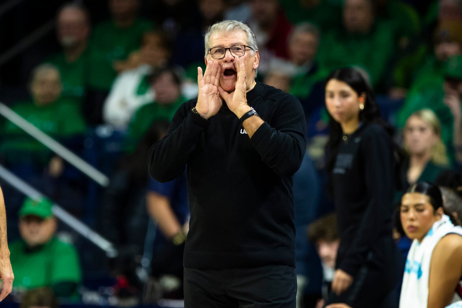 UConn head coach Geno Auriemma shouts towards the court during the first half of an NCAA college basketball game Thursday, Dec. 12, 2024, in South Bend, Ind. (AP Photo/Michael Caterina)